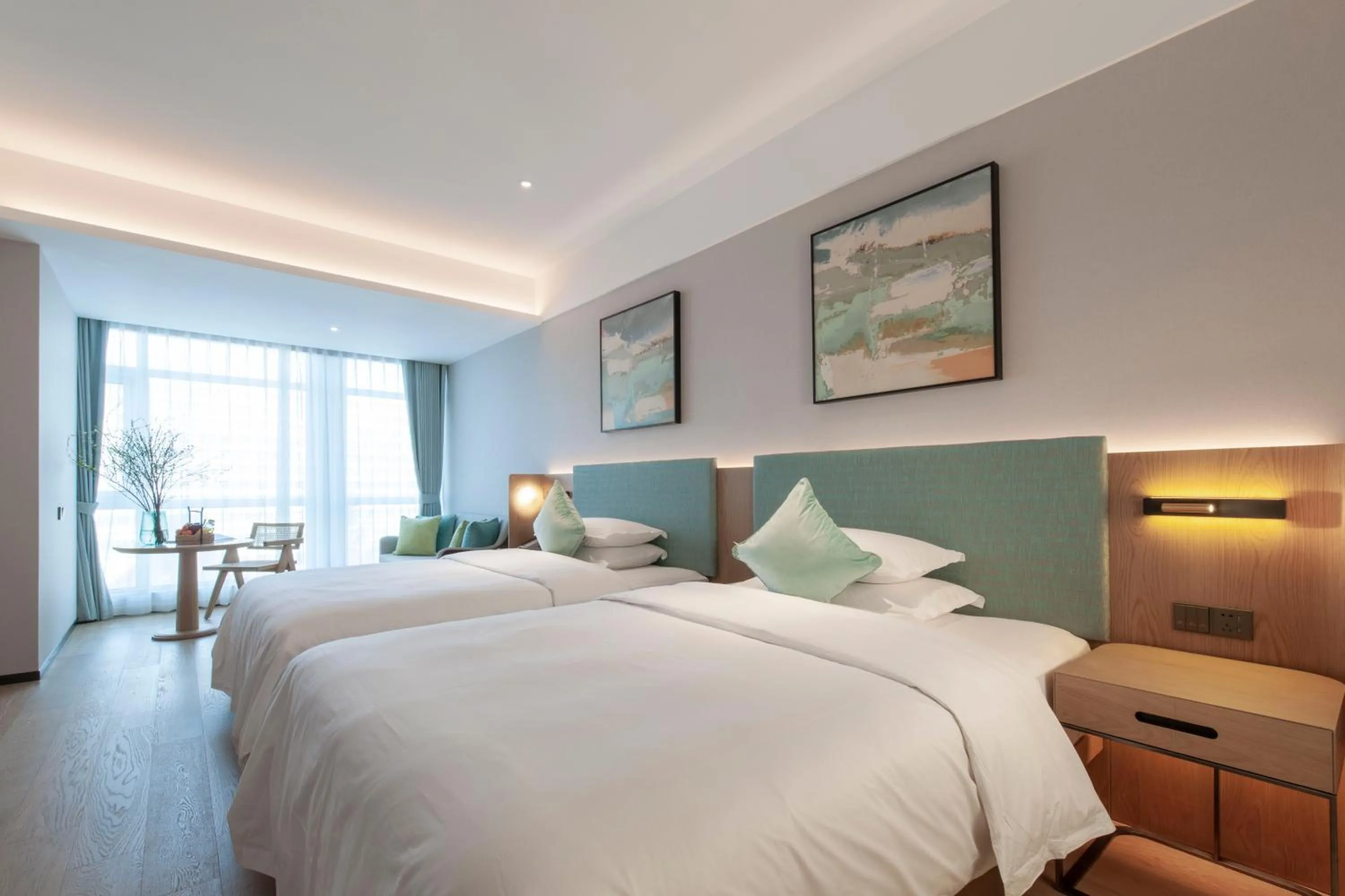 Photo of the whole room, Bed in SSAW Boutique Hotel ZHIJIANG IMPRESSION