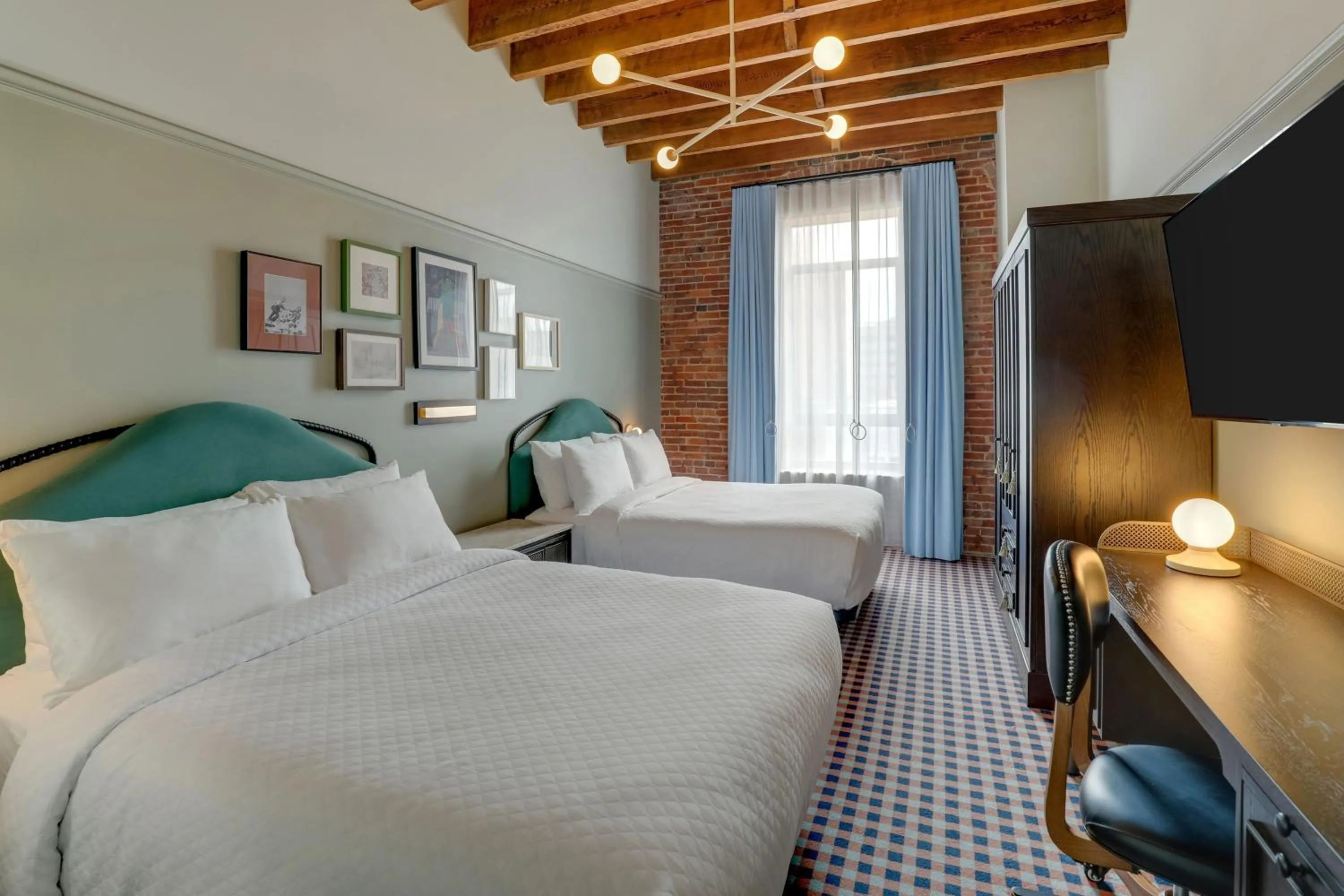 Photo of the whole room, Bed in Trilogy Hotel Montgomery, Autograph Collection