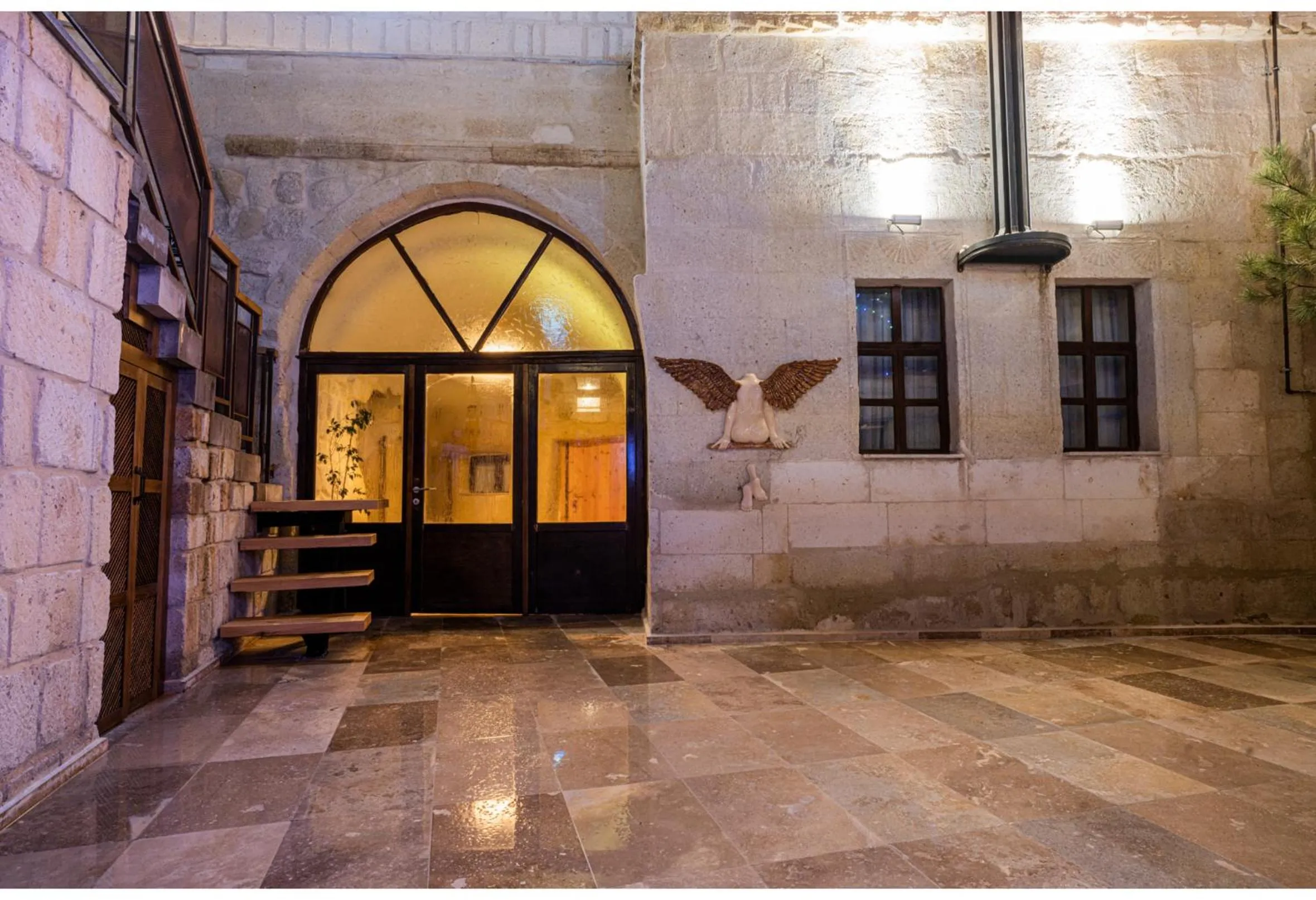 Facade/entrance in Bala Cave House