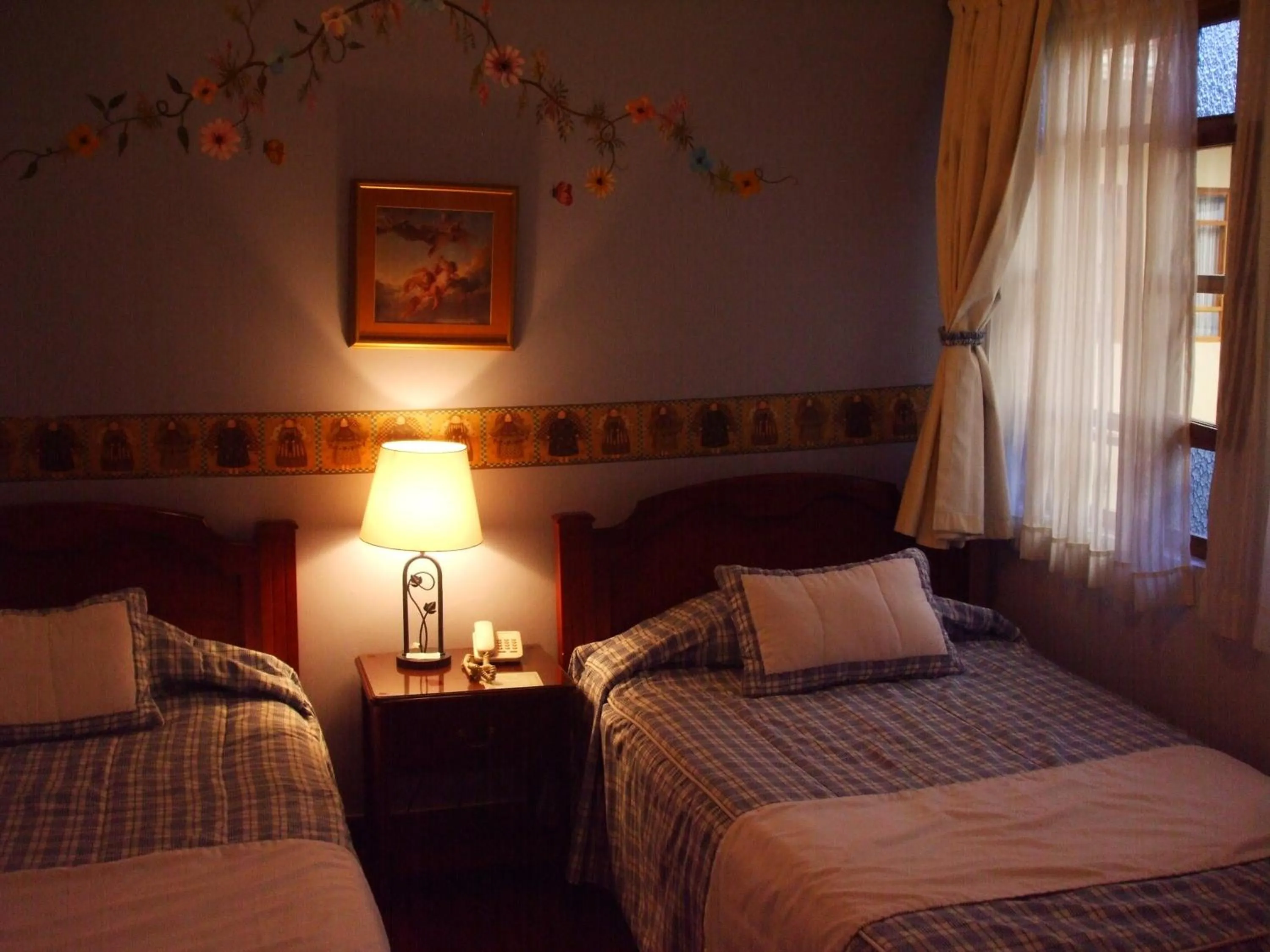 Bed in Hotel Posada del Angel