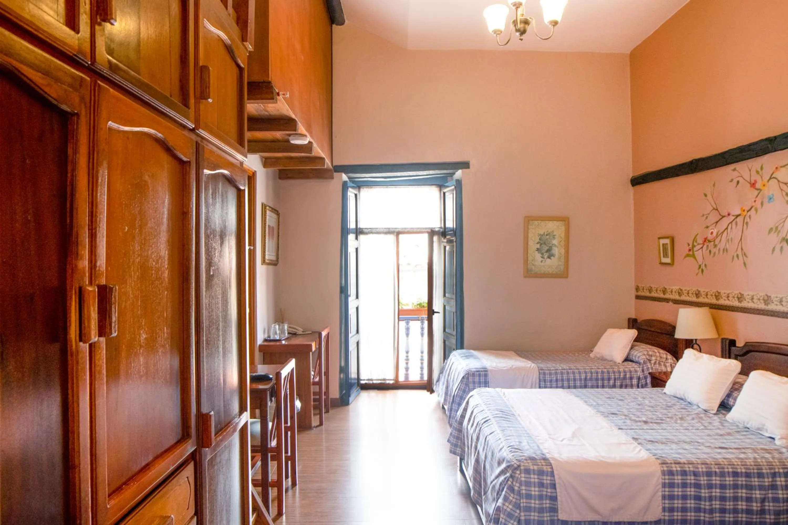 Balcony/Terrace, Bed in Hotel Posada del Angel