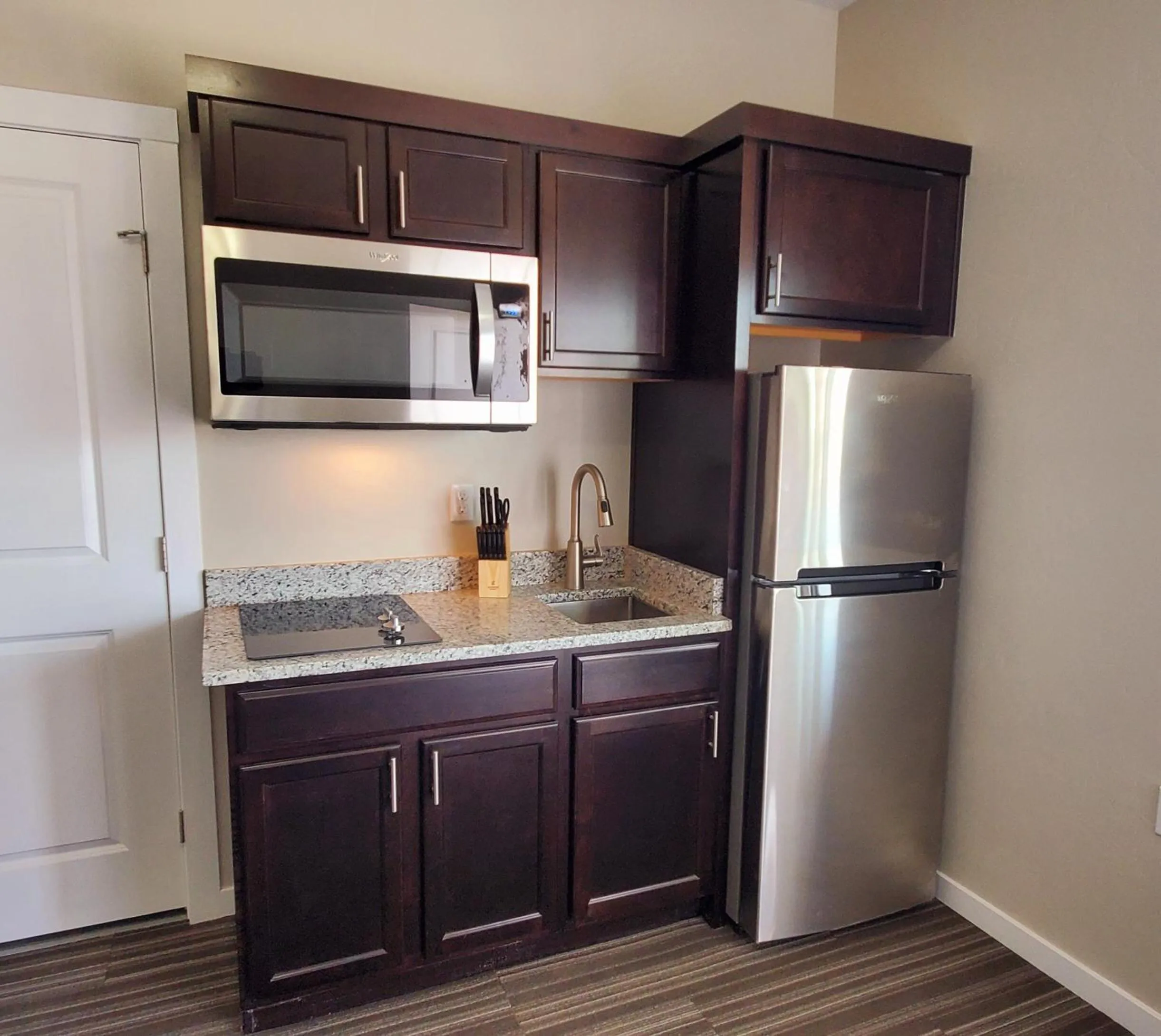 Kitchen or kitchenette in Longhorn Flats