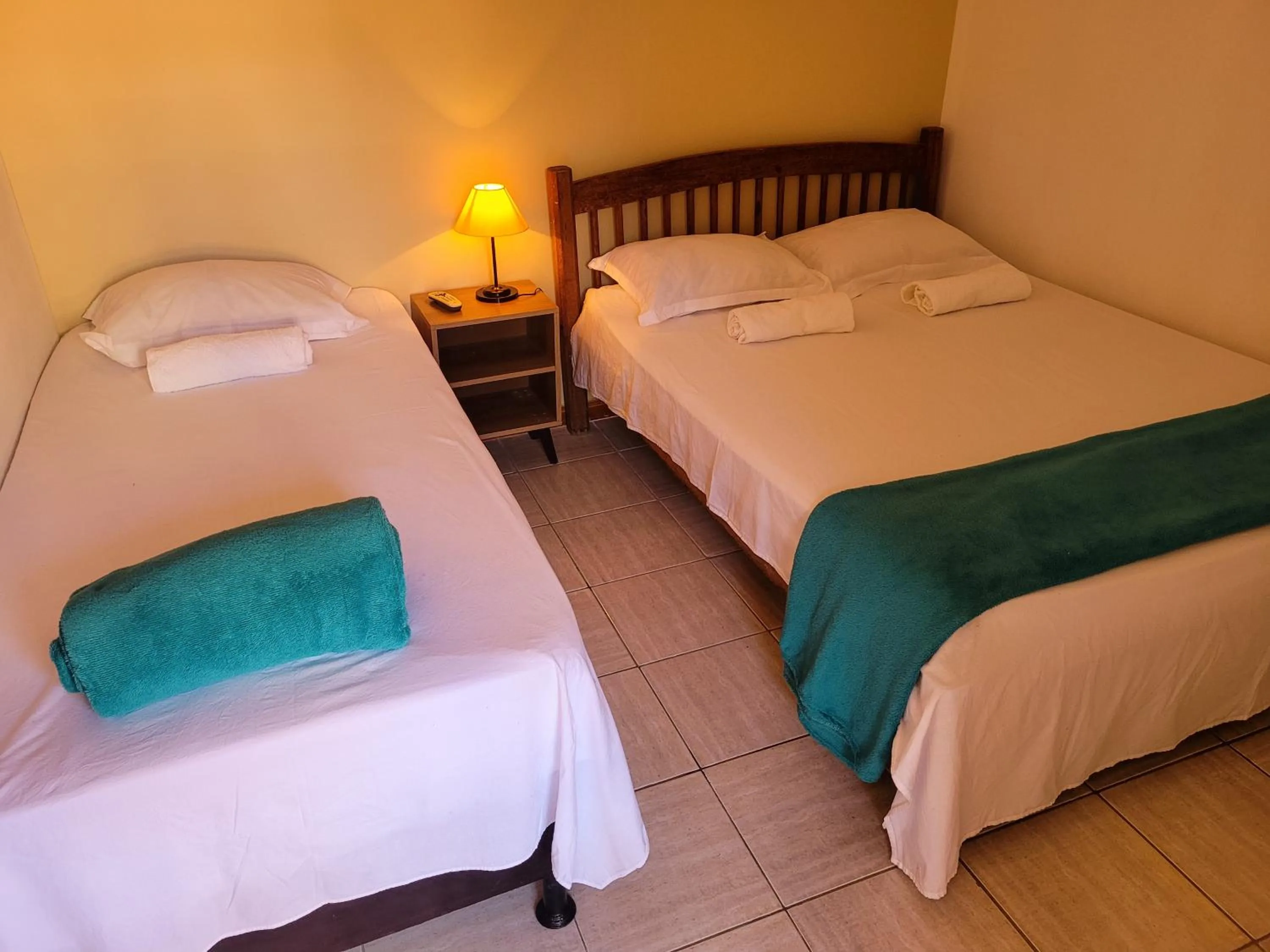 Bed in Pousada Villa Coelho