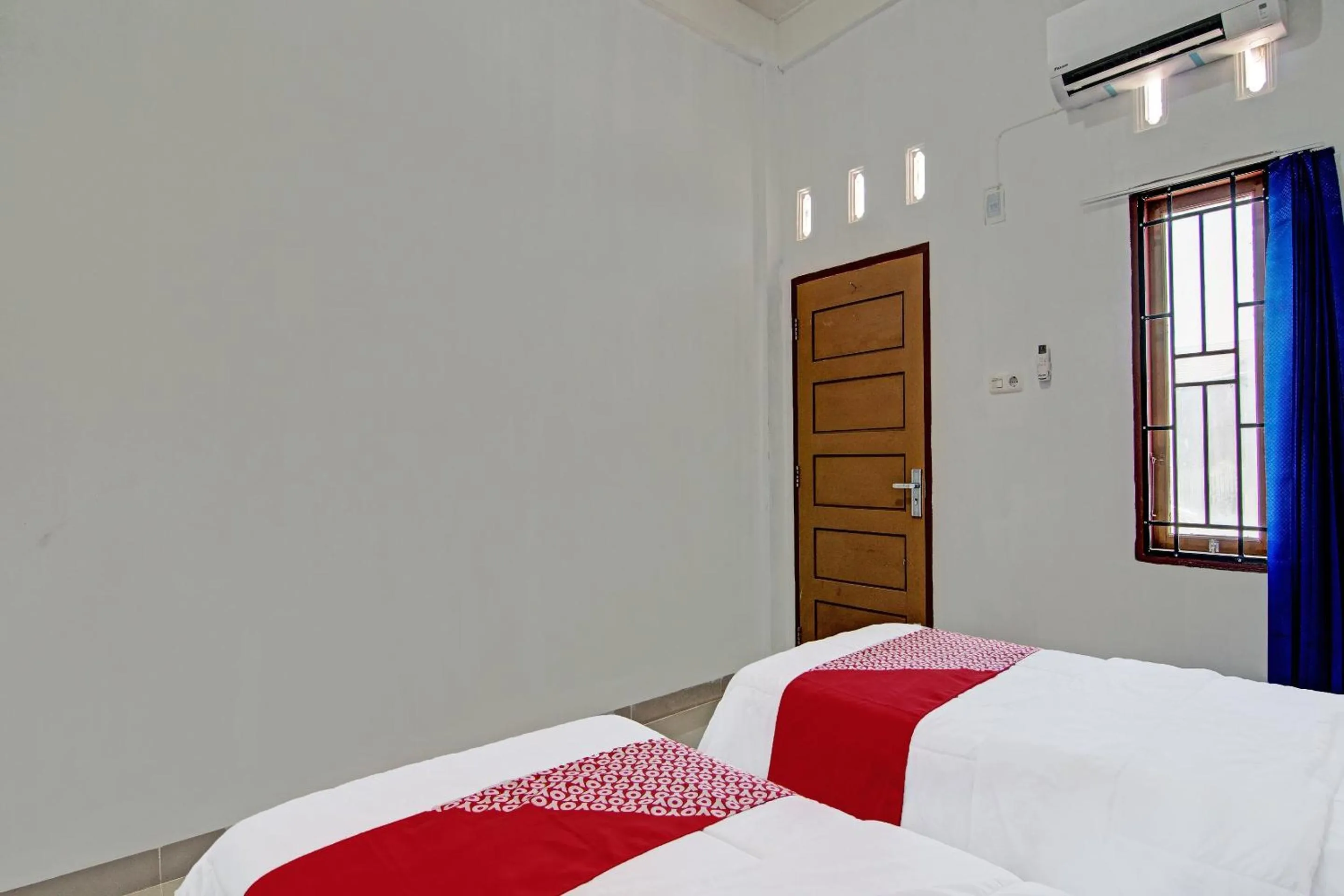 Bedroom in OYO 92135 A3 Homestay Syariah Executive