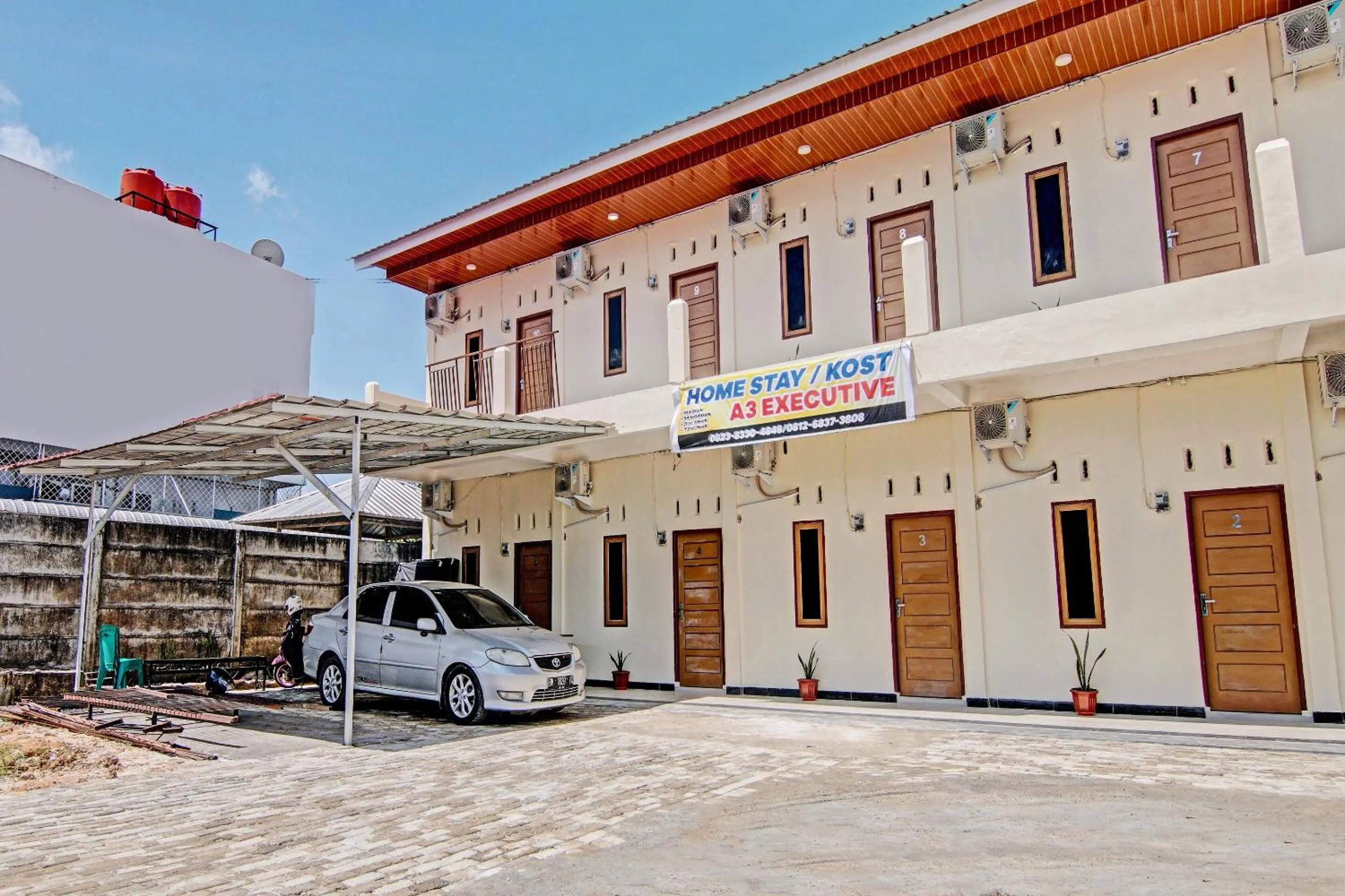 Facade/entrance in OYO 92135 A3 Homestay Syariah Executive