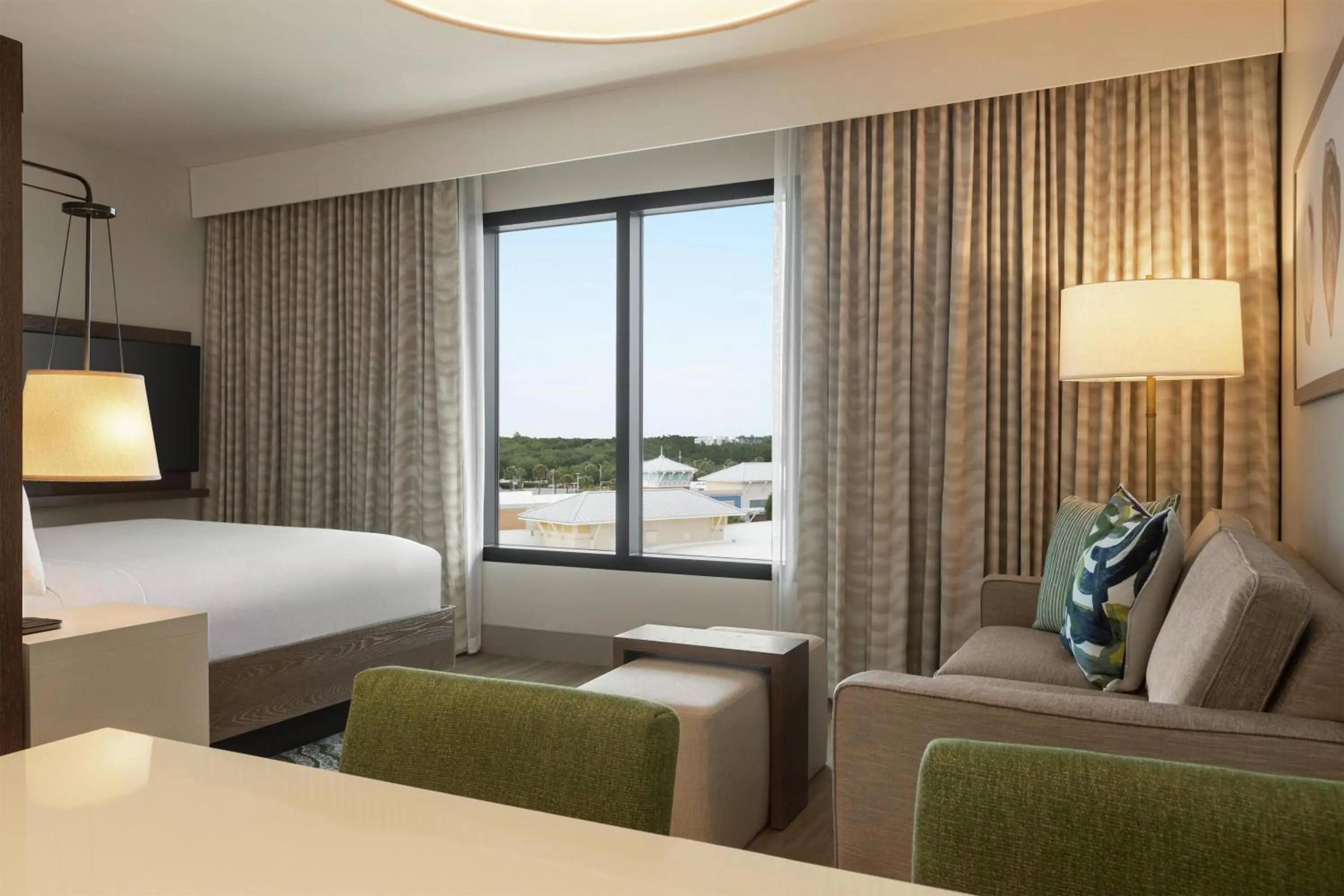 Living room, Bed in Embassy Suites By Hilton Panama City Beach Resort