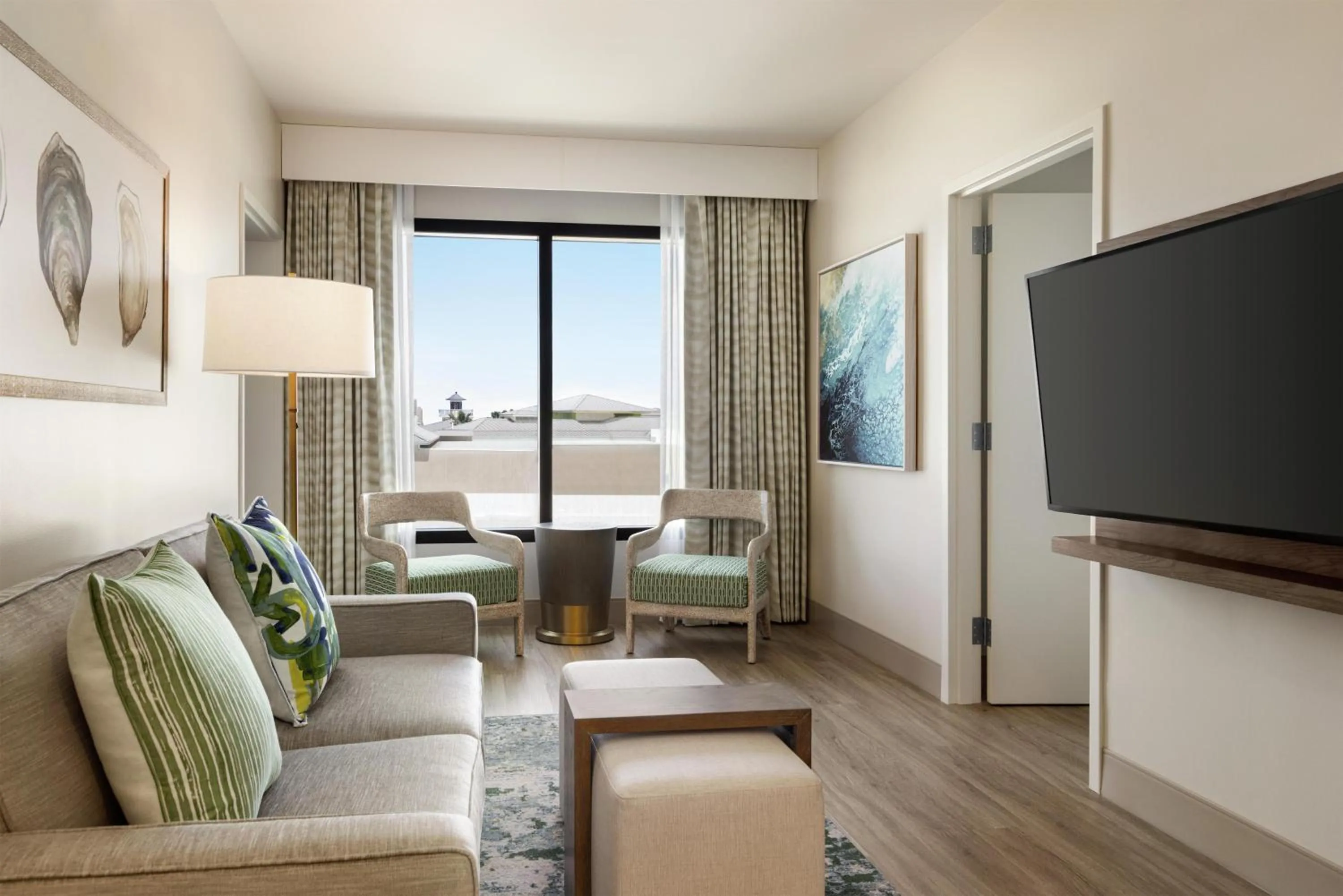 Living room in Embassy Suites By Hilton Panama City Beach Resort