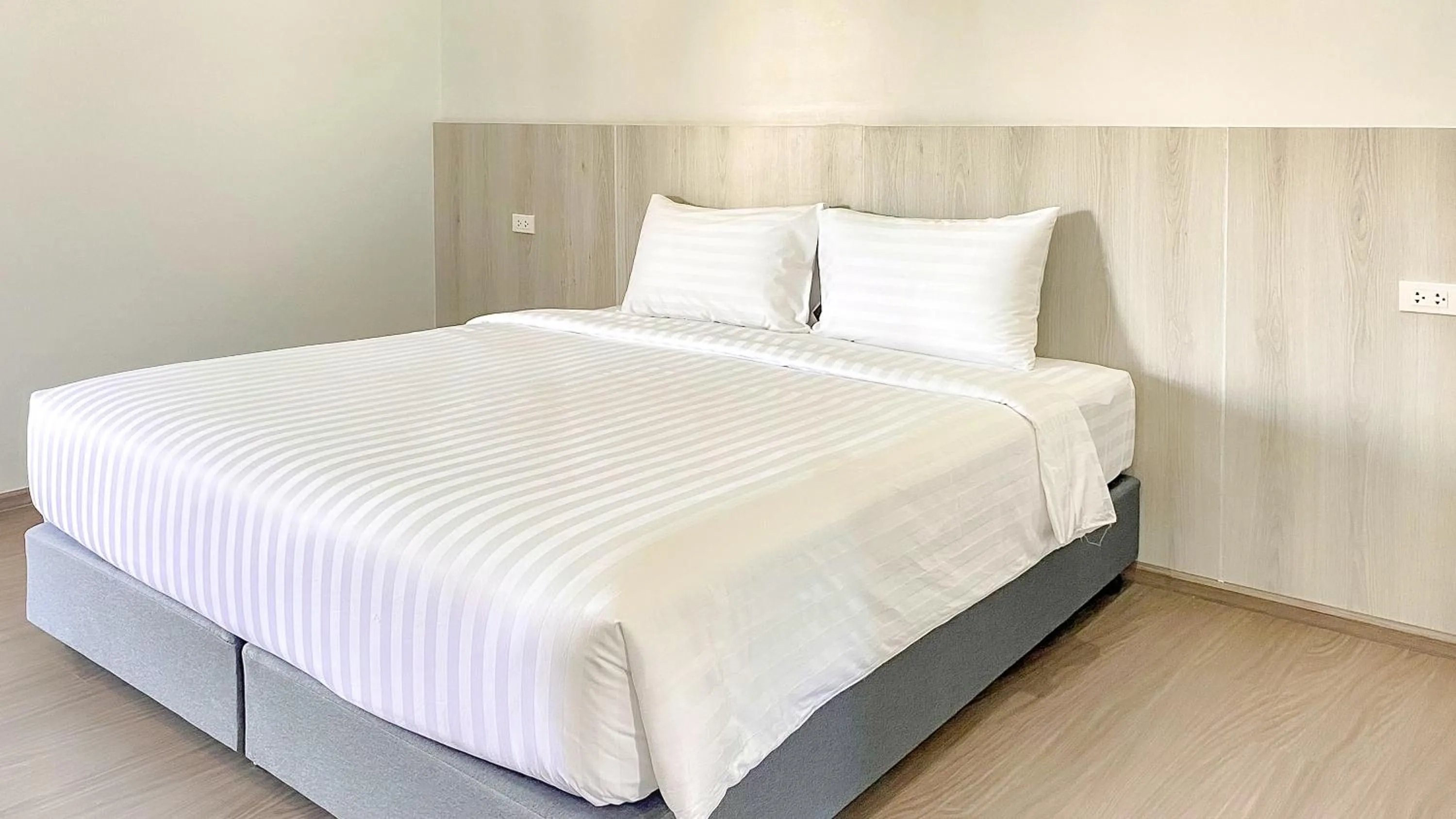 Bed in น่าน ม่วนใจ Nan Muanjai Hotel