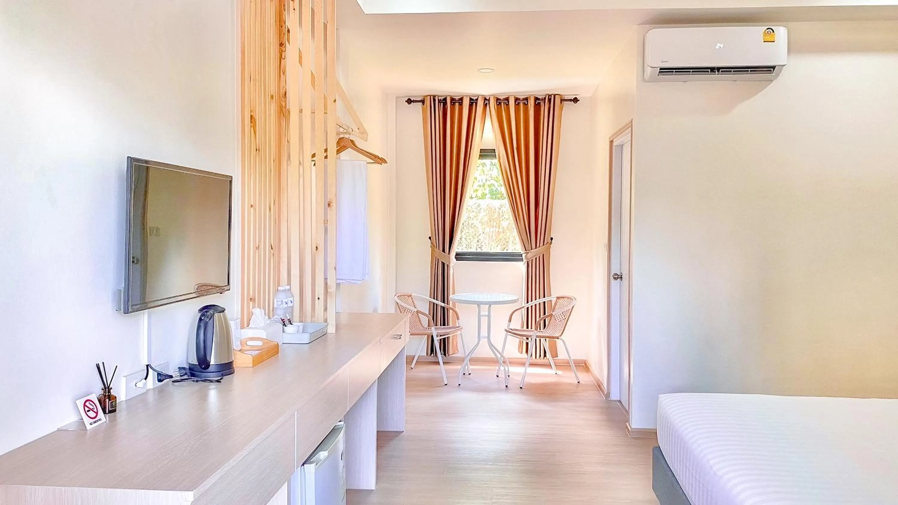 Bed in น่าน ม่วนใจ Nan Muanjai Hotel