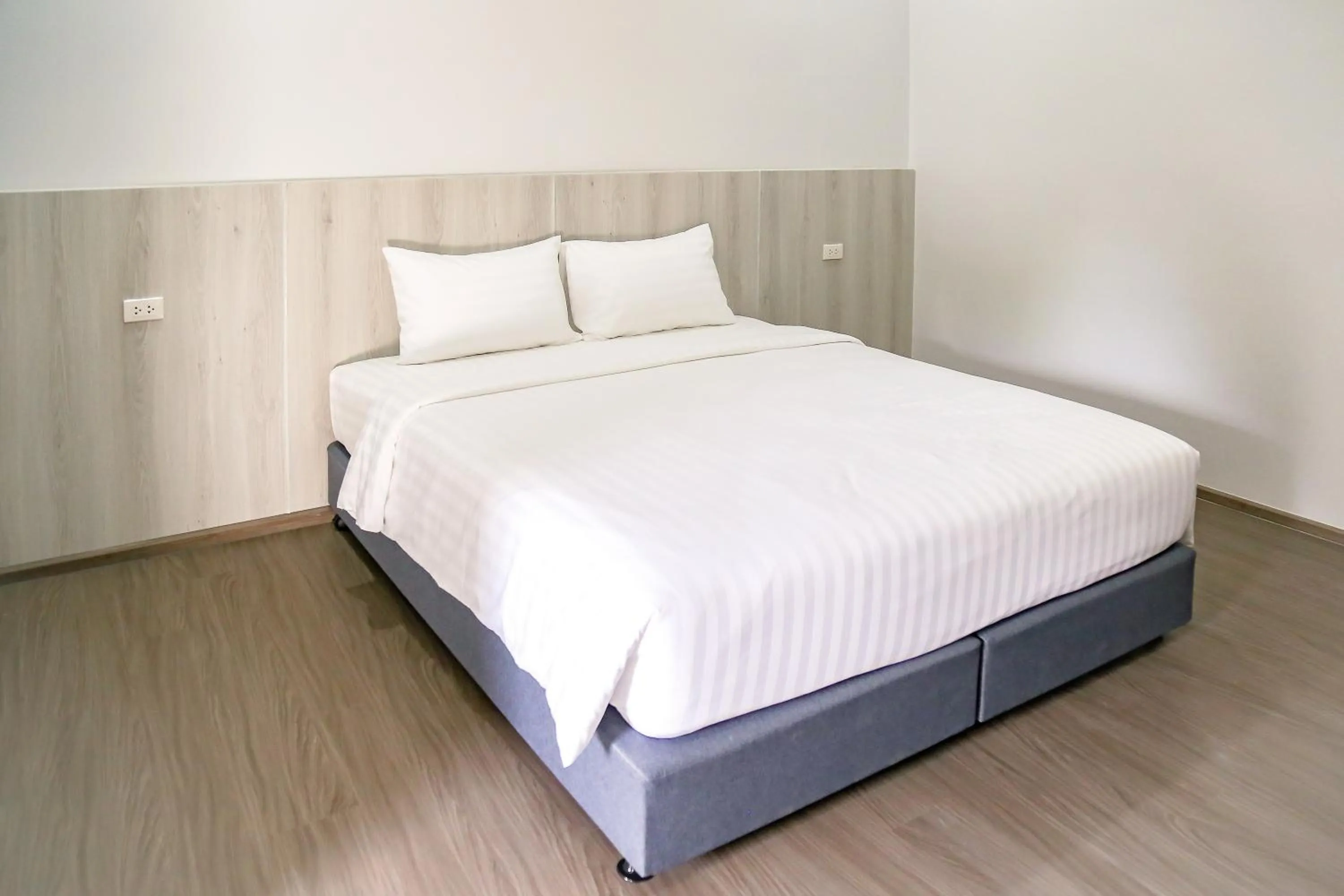 Bedroom, Bed in น่าน ม่วนใจ Nan Muanjai Hotel