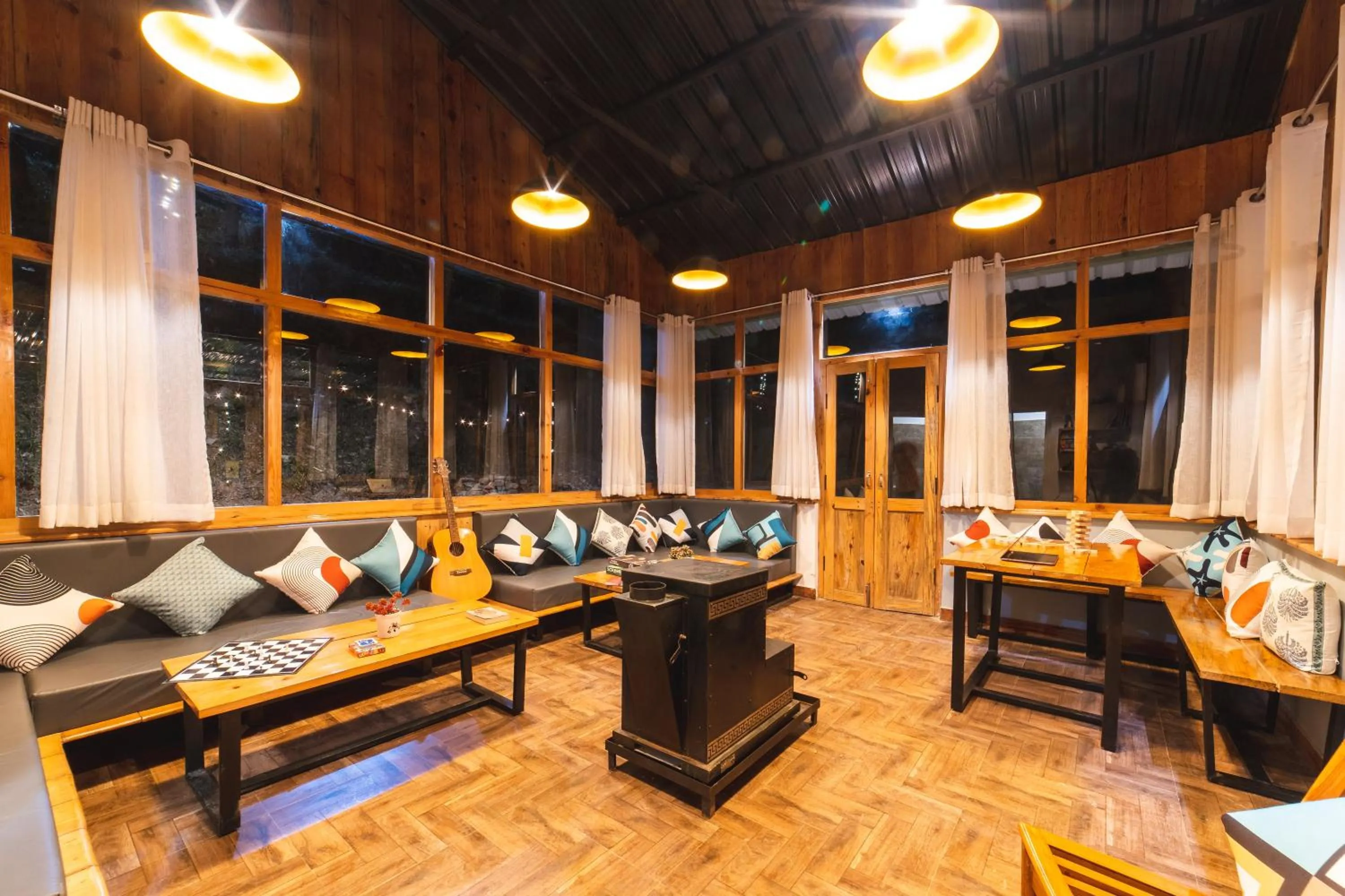 Living room in Zostel Plus Nainital, Naina Range