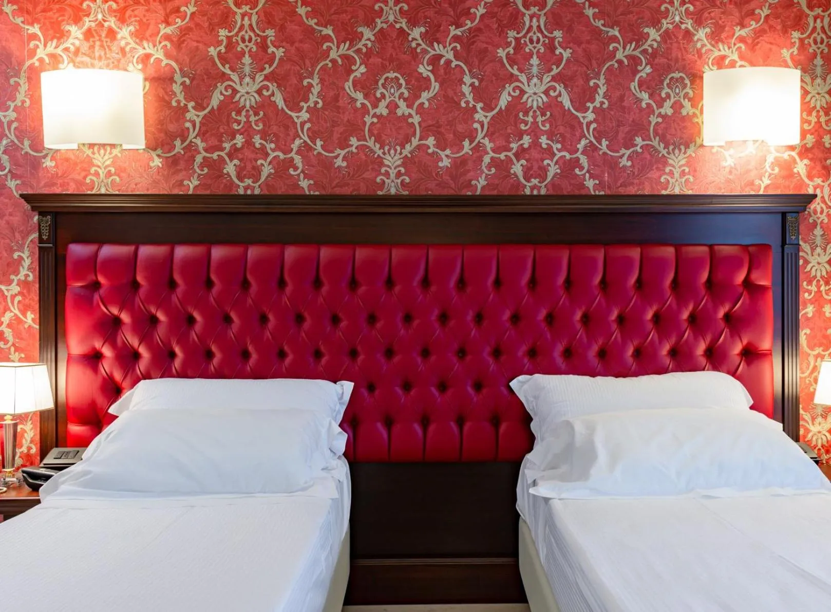 Bed in La Paloma Blanca Hotel