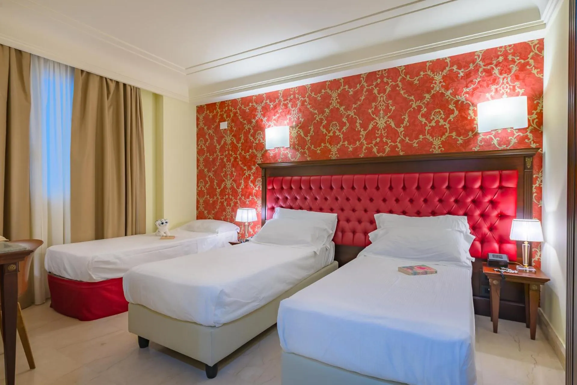 Bed in La Paloma Blanca Hotel