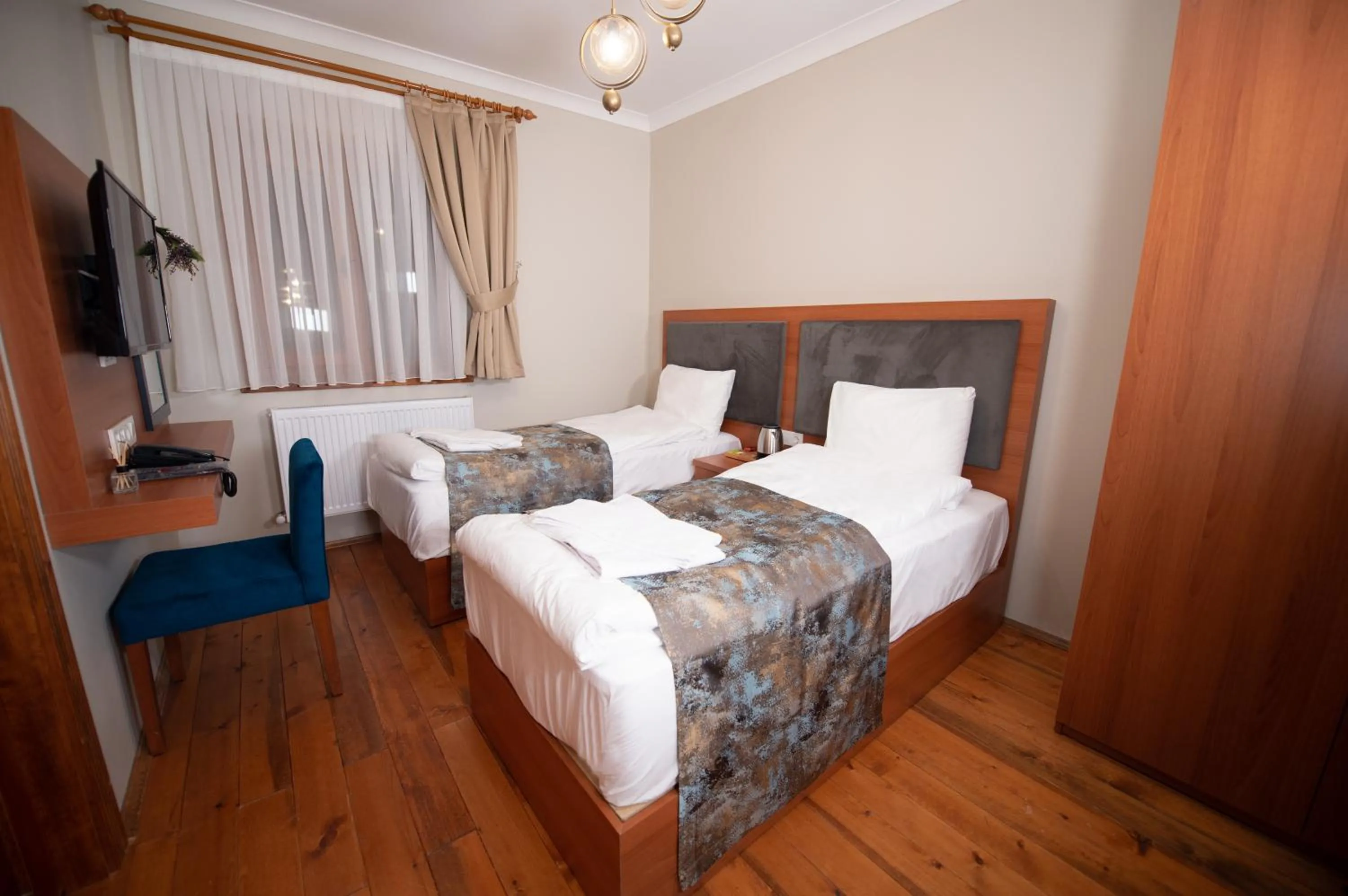 Bed in AHISKA PALAS OTEL