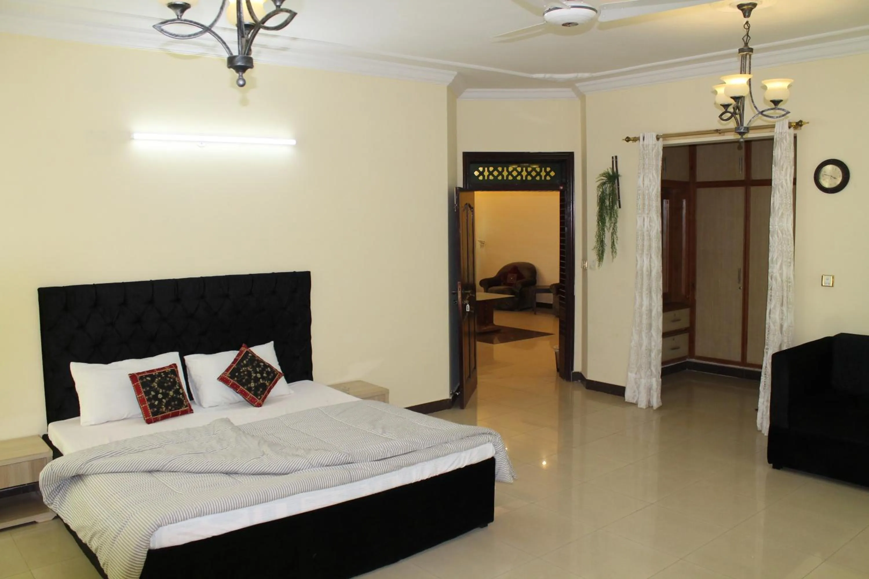 Bed in MUDAN Residency