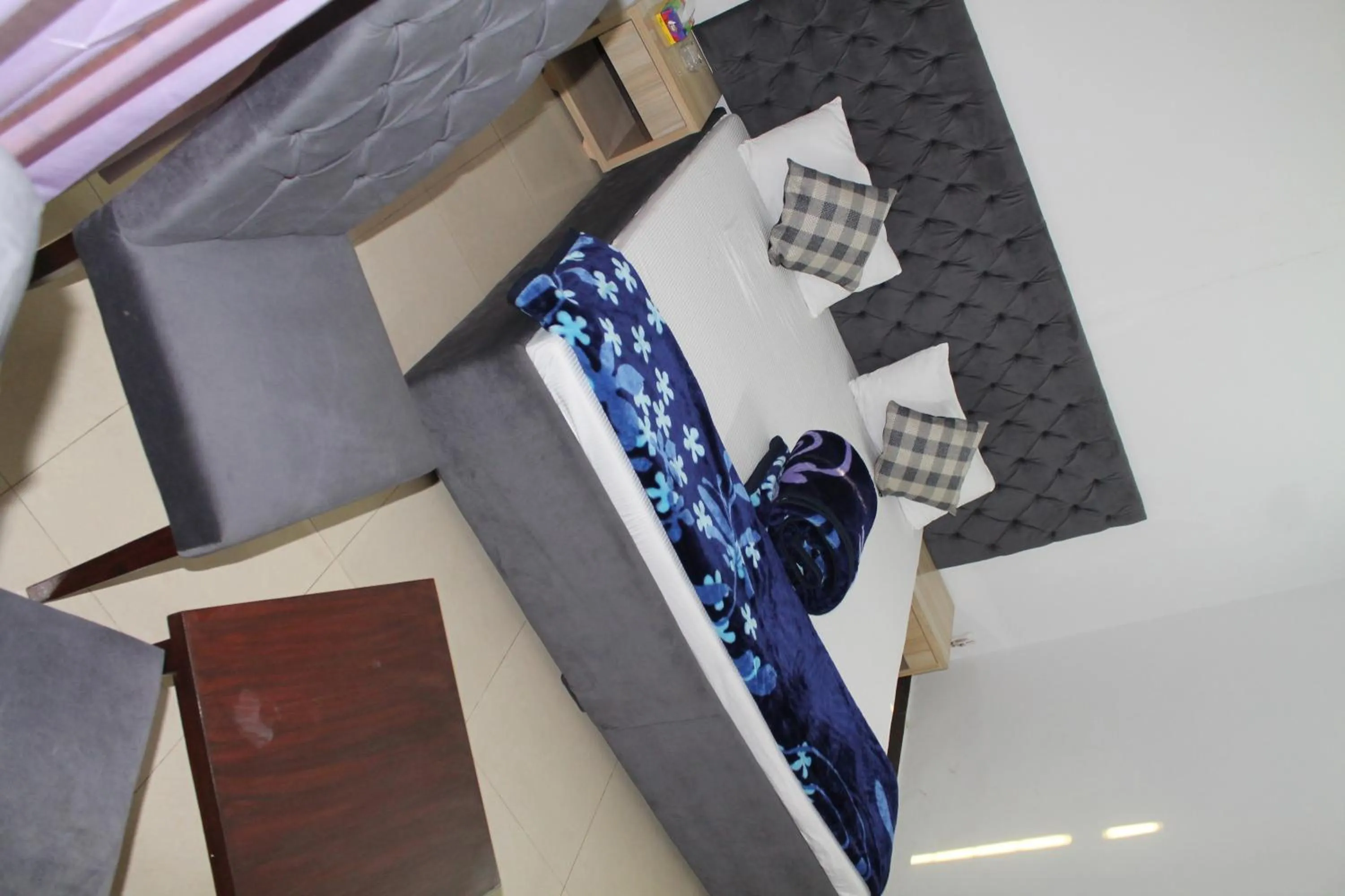 Bed in MUDAN Residency