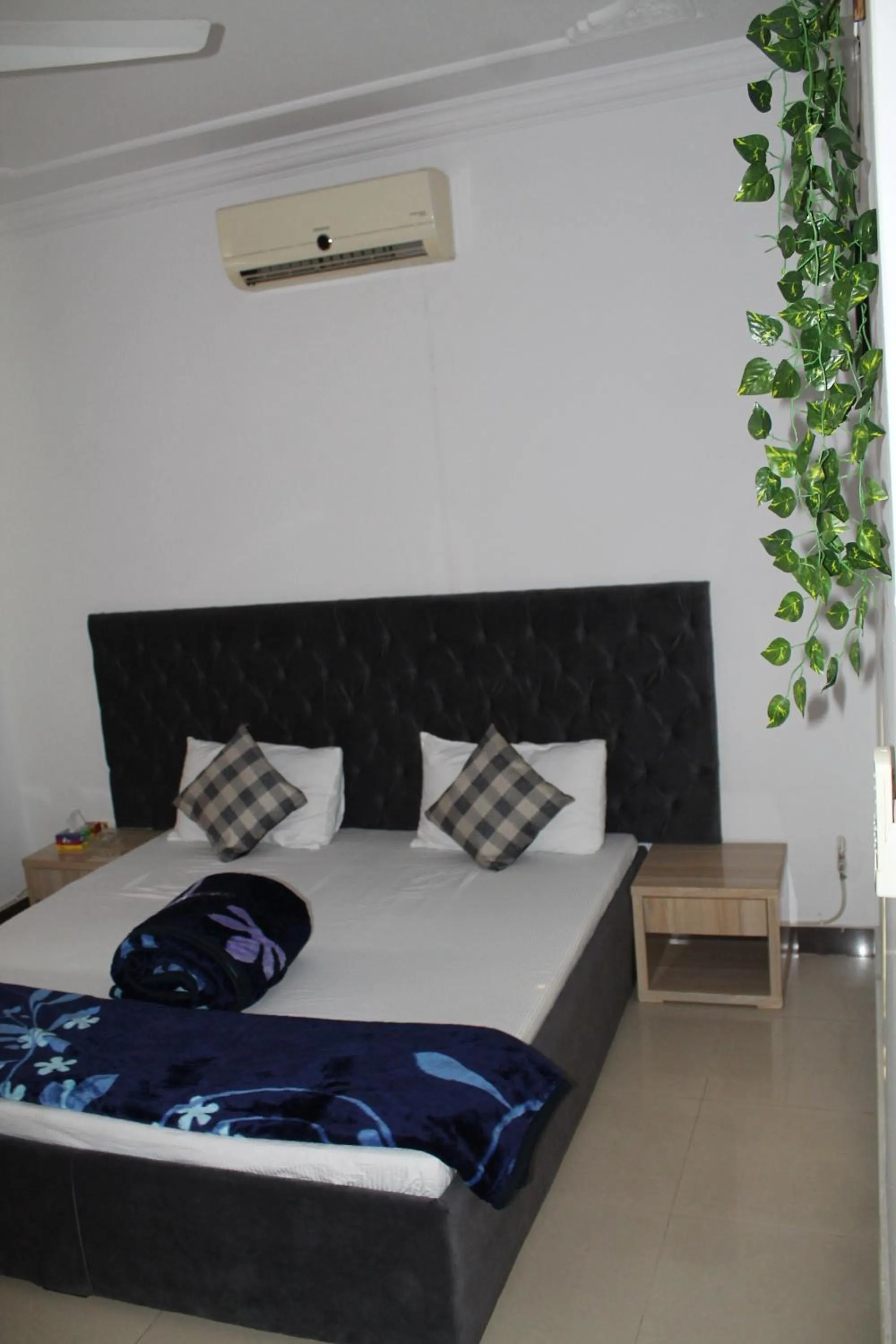 Bed in MUDAN Residency