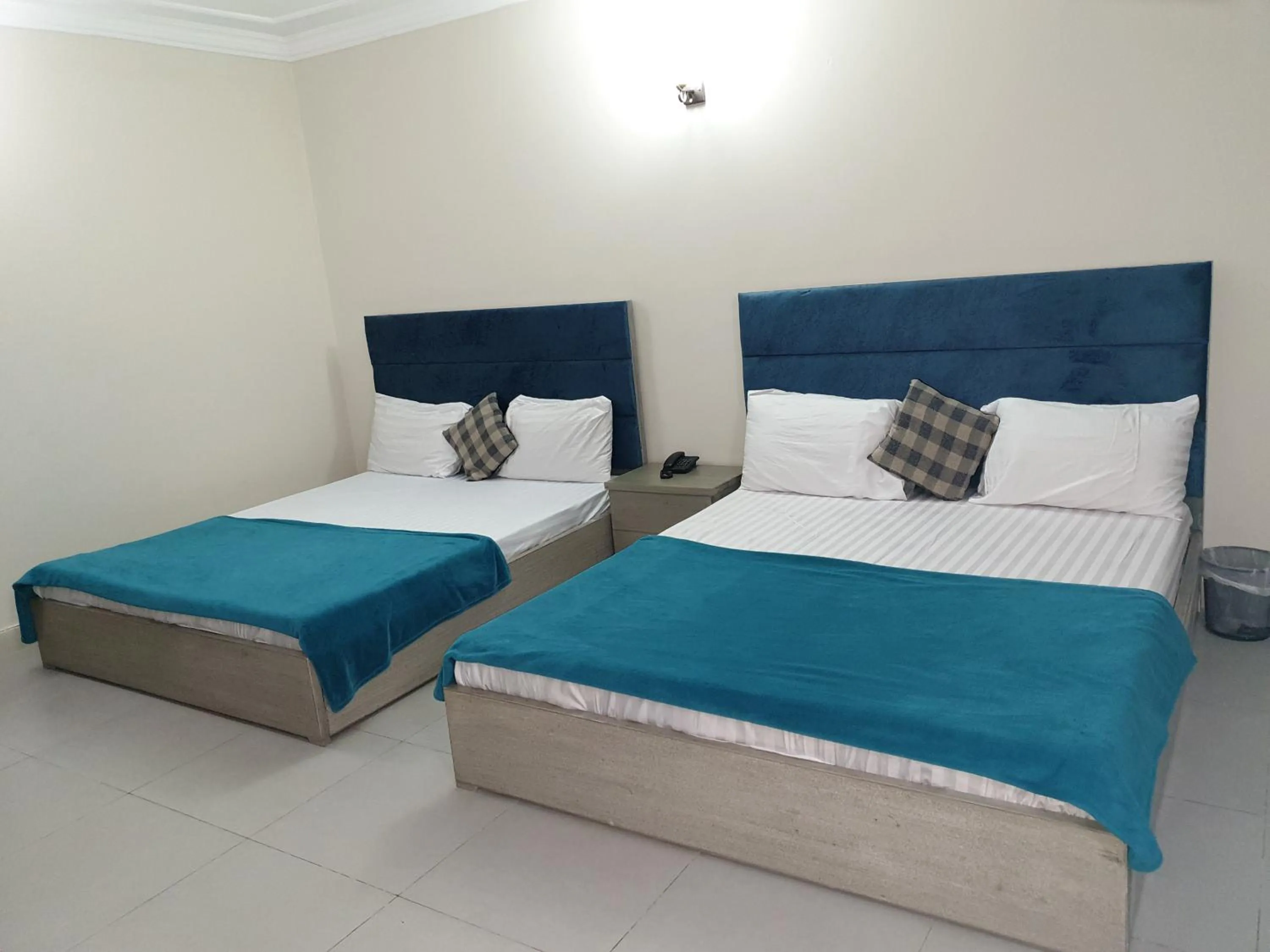 Bed in MUDAN Residency