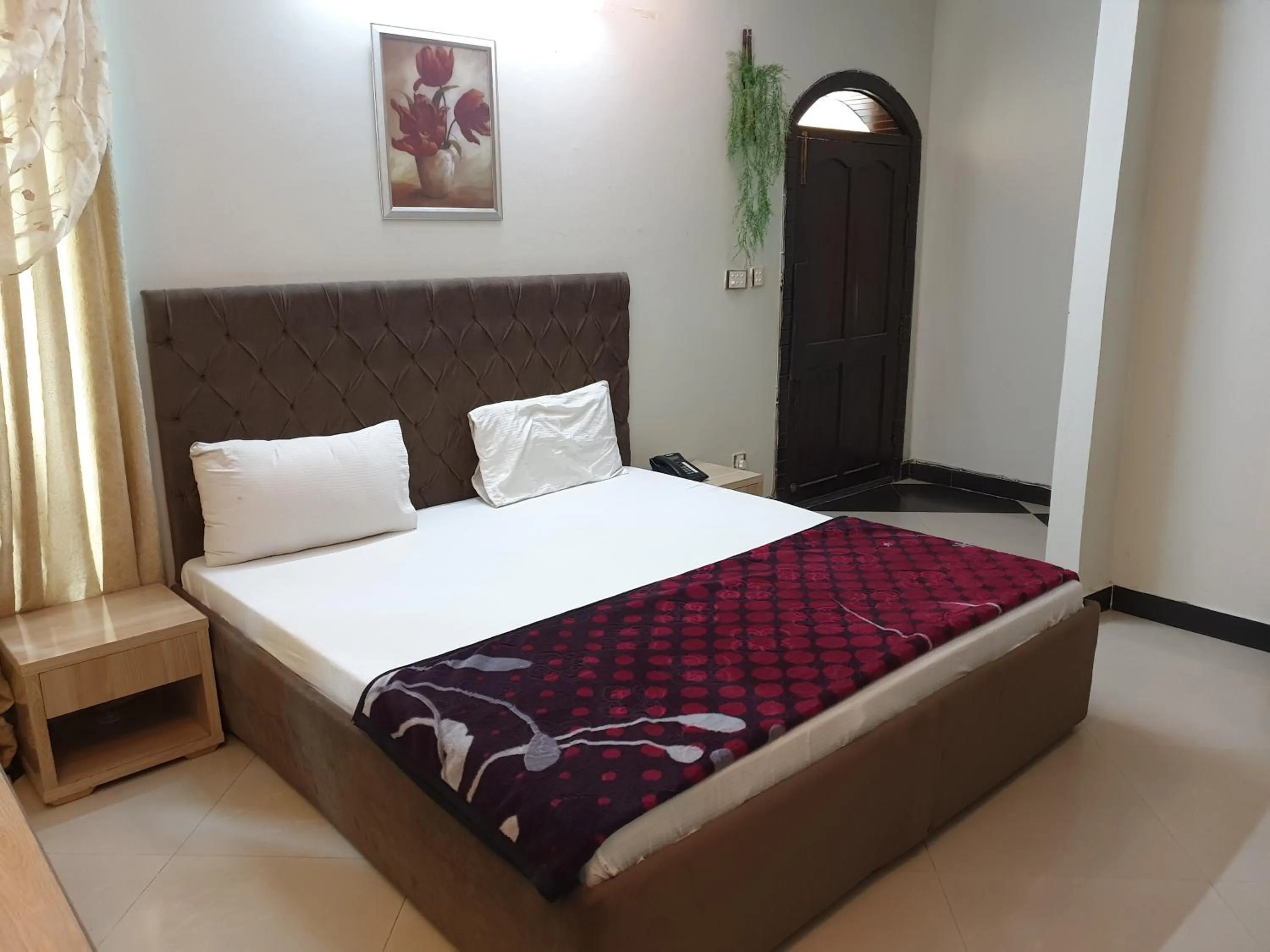 Bed in MUDAN Residency