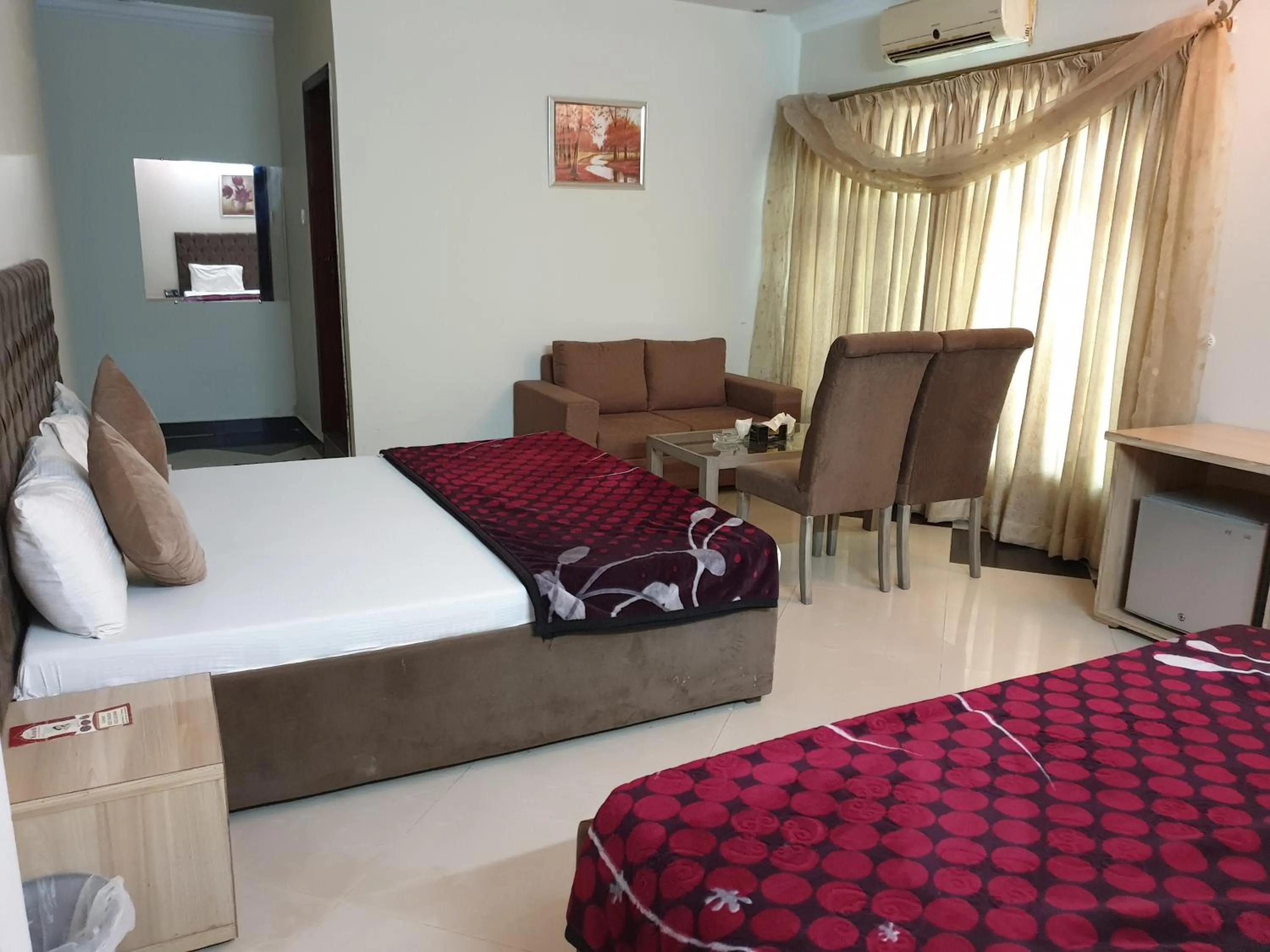 Bed in MUDAN Residency