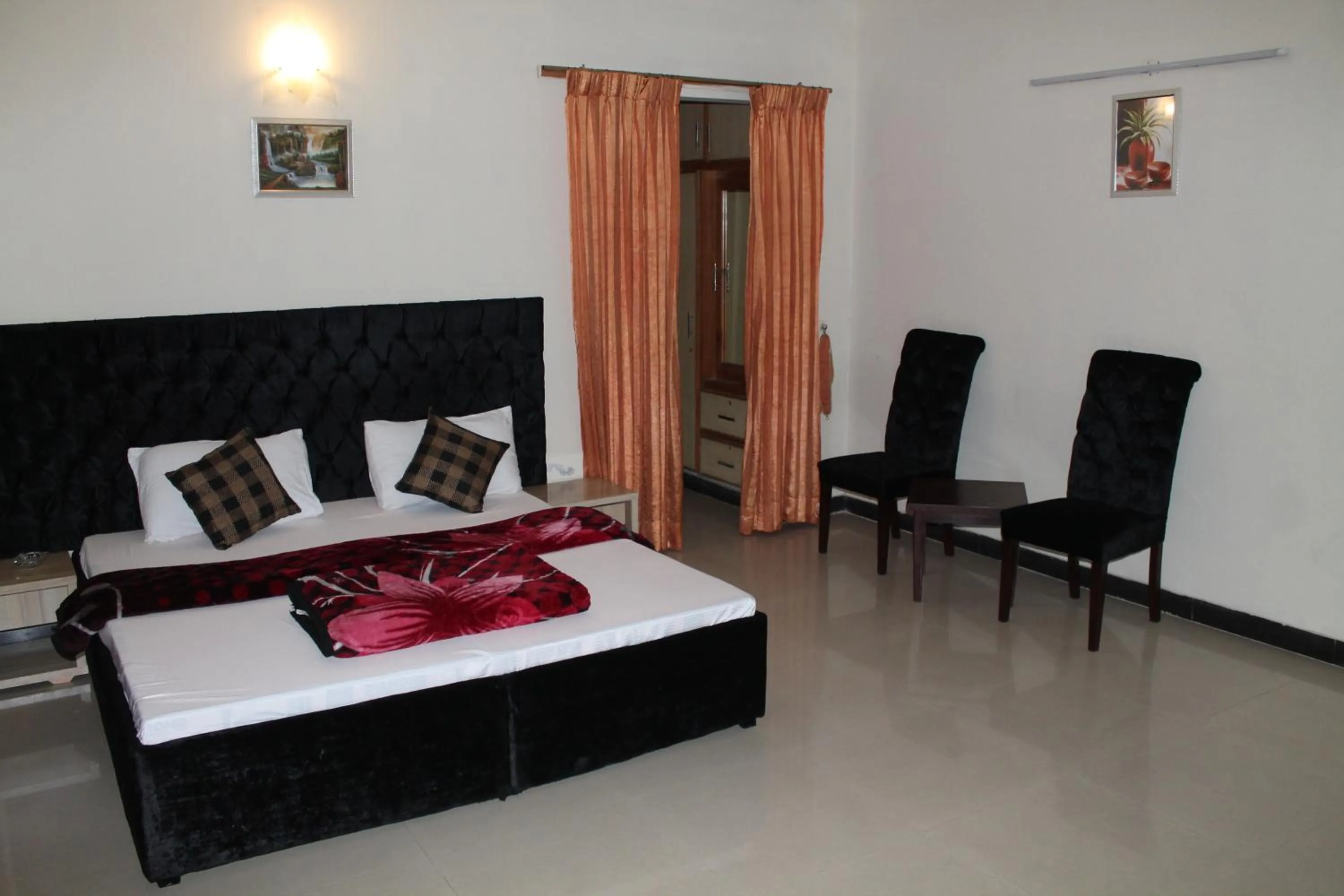 Bed in MUDAN Residency