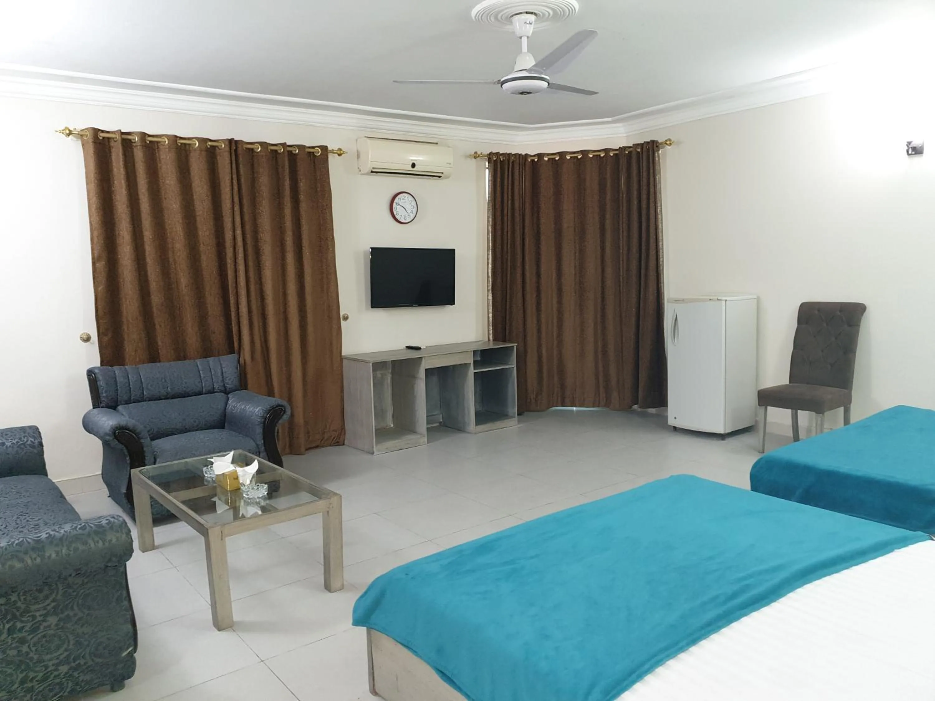 Bed in MUDAN Residency