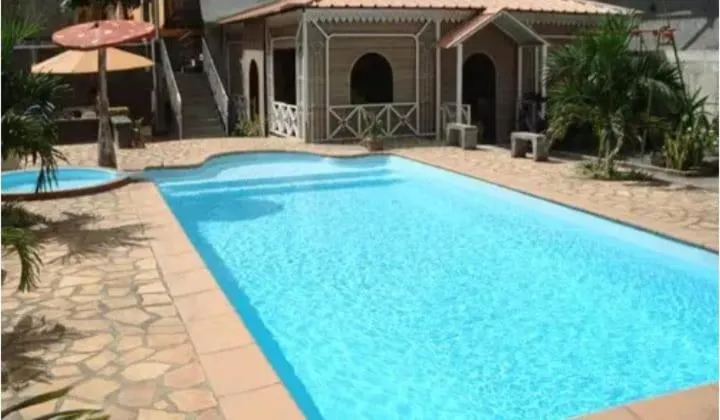 Swimming pool in Euro Vacances Guest House