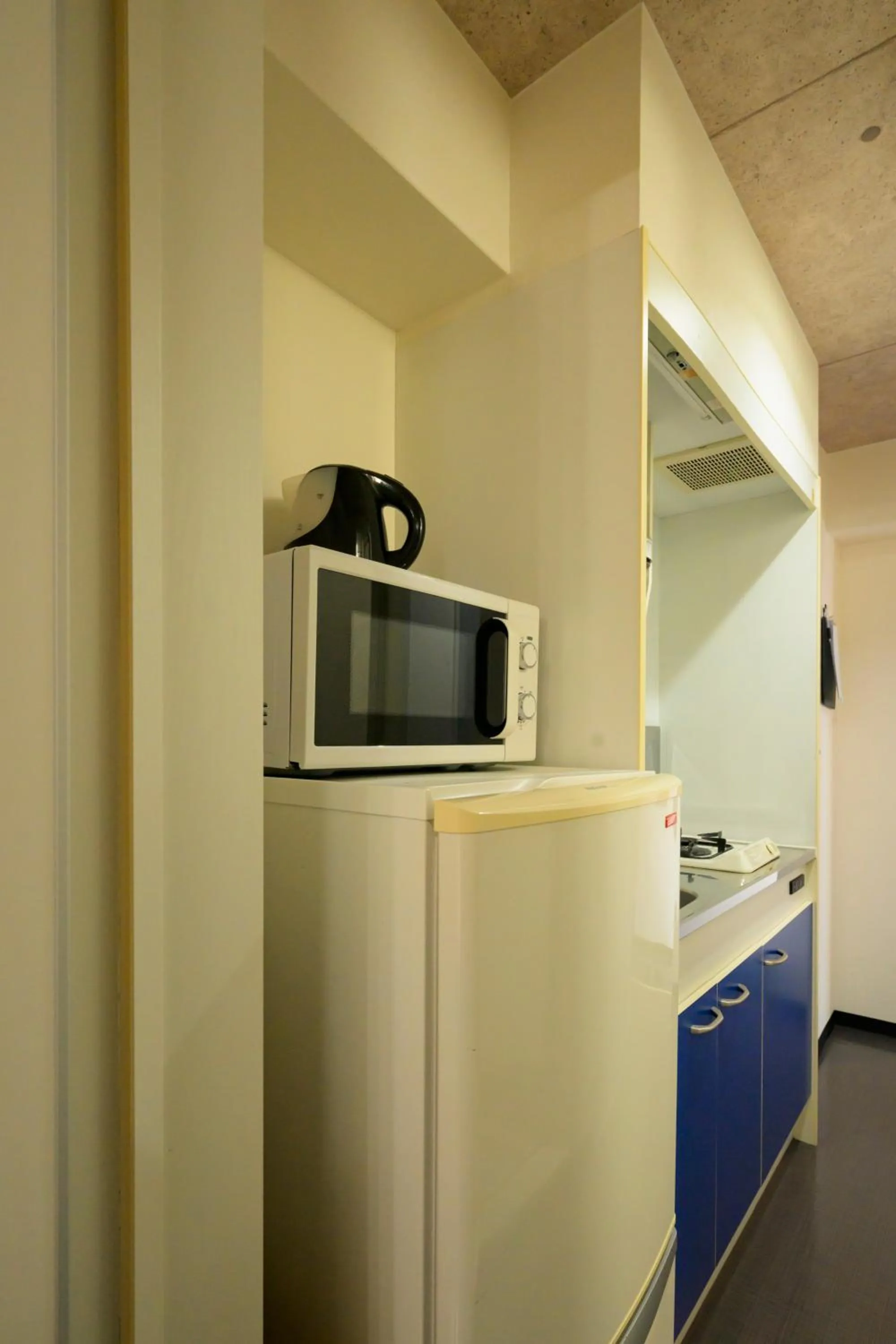 Kitchen or kitchenette in HOTEL AARON通天東