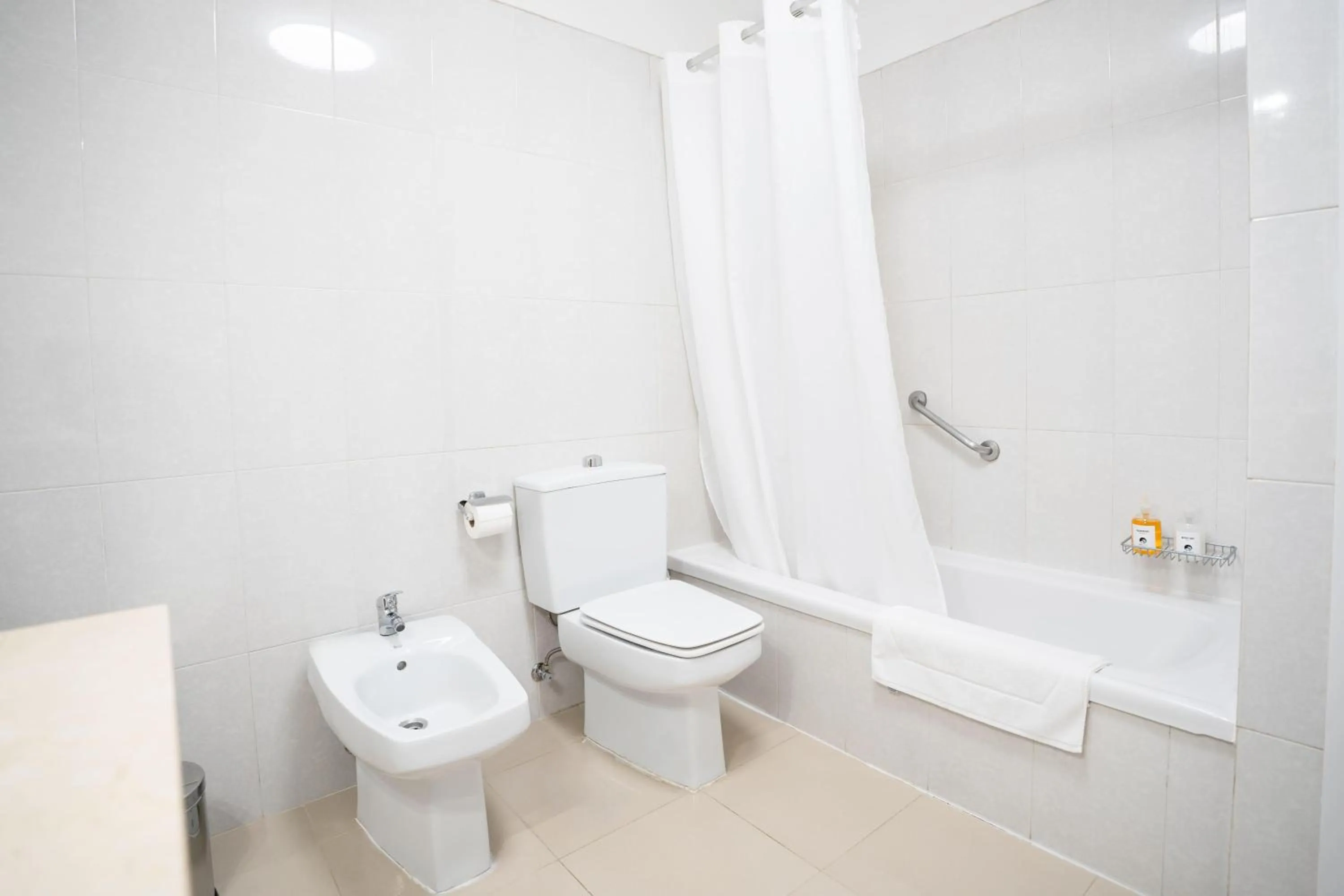 Bathroom in Coral La Quinta Park Suites