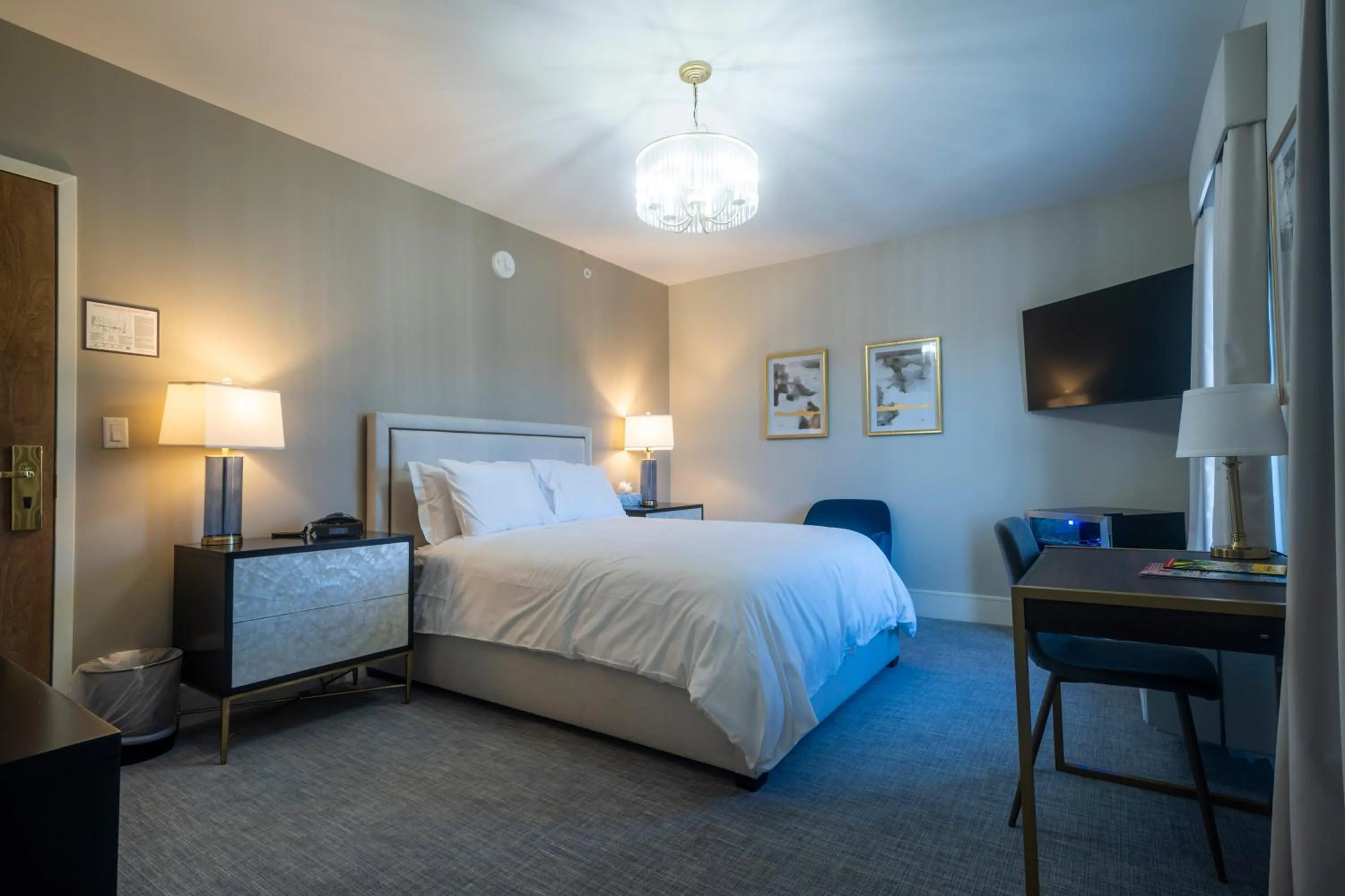 Bed in Orange Inn Boutique Hotel