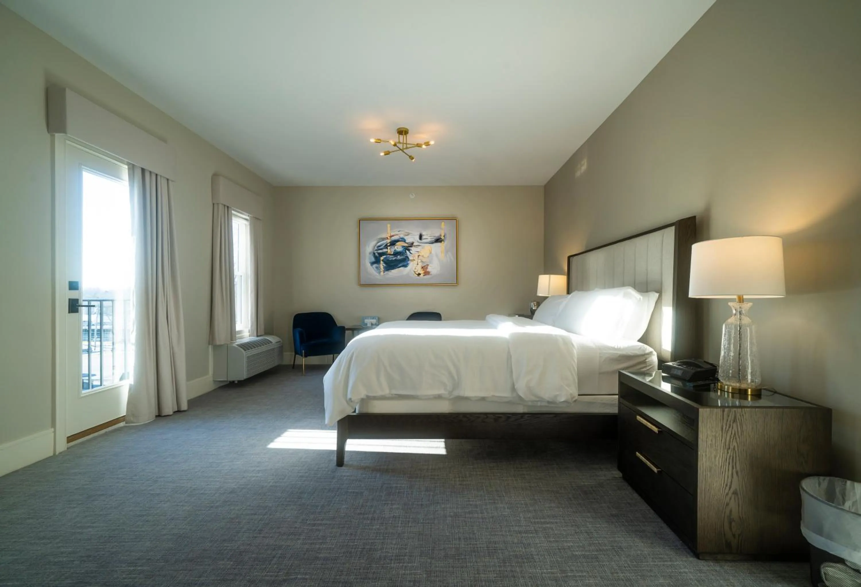 Bed in Orange Inn Boutique Hotel