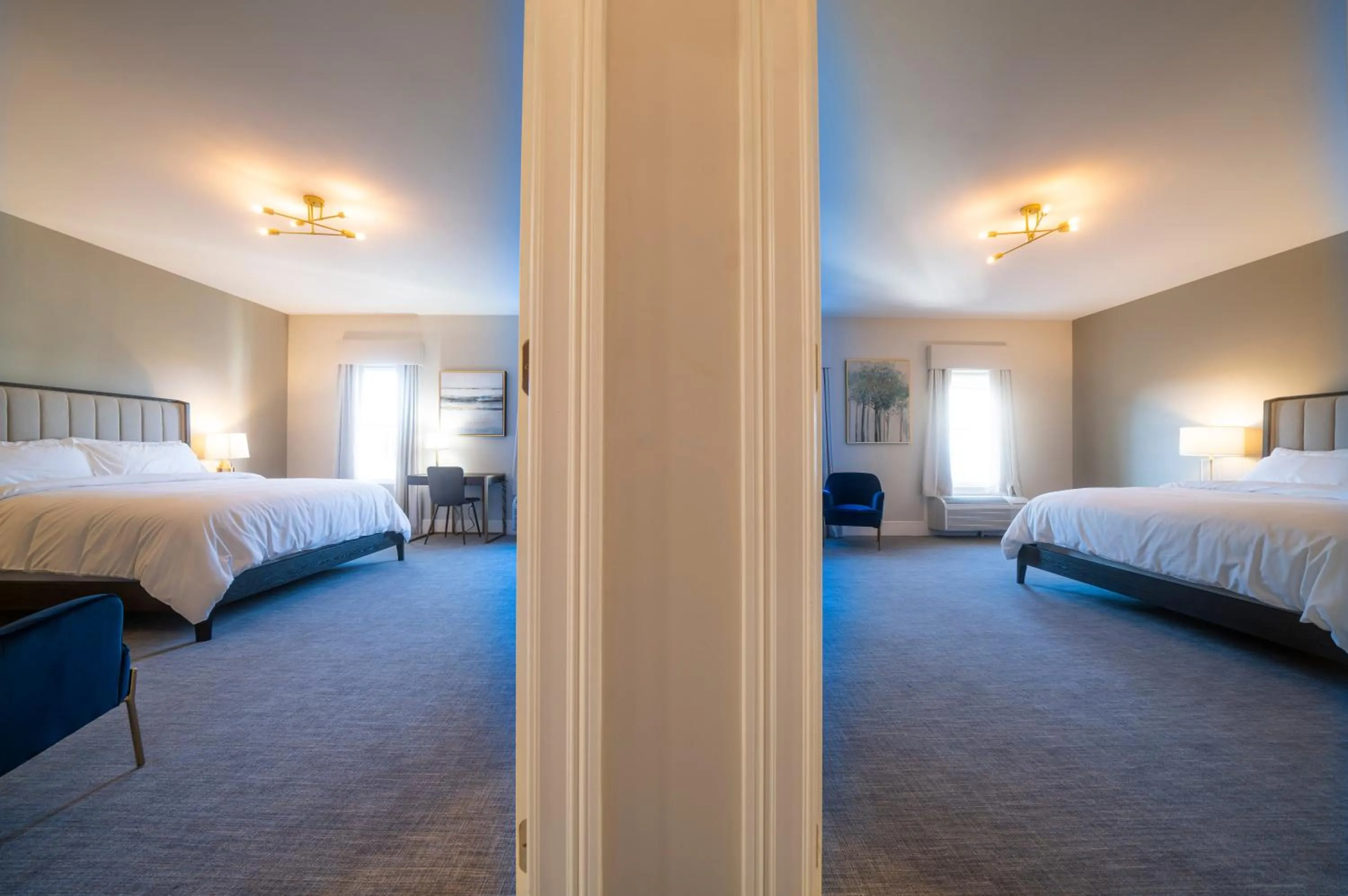 Bed in Orange Inn Boutique Hotel