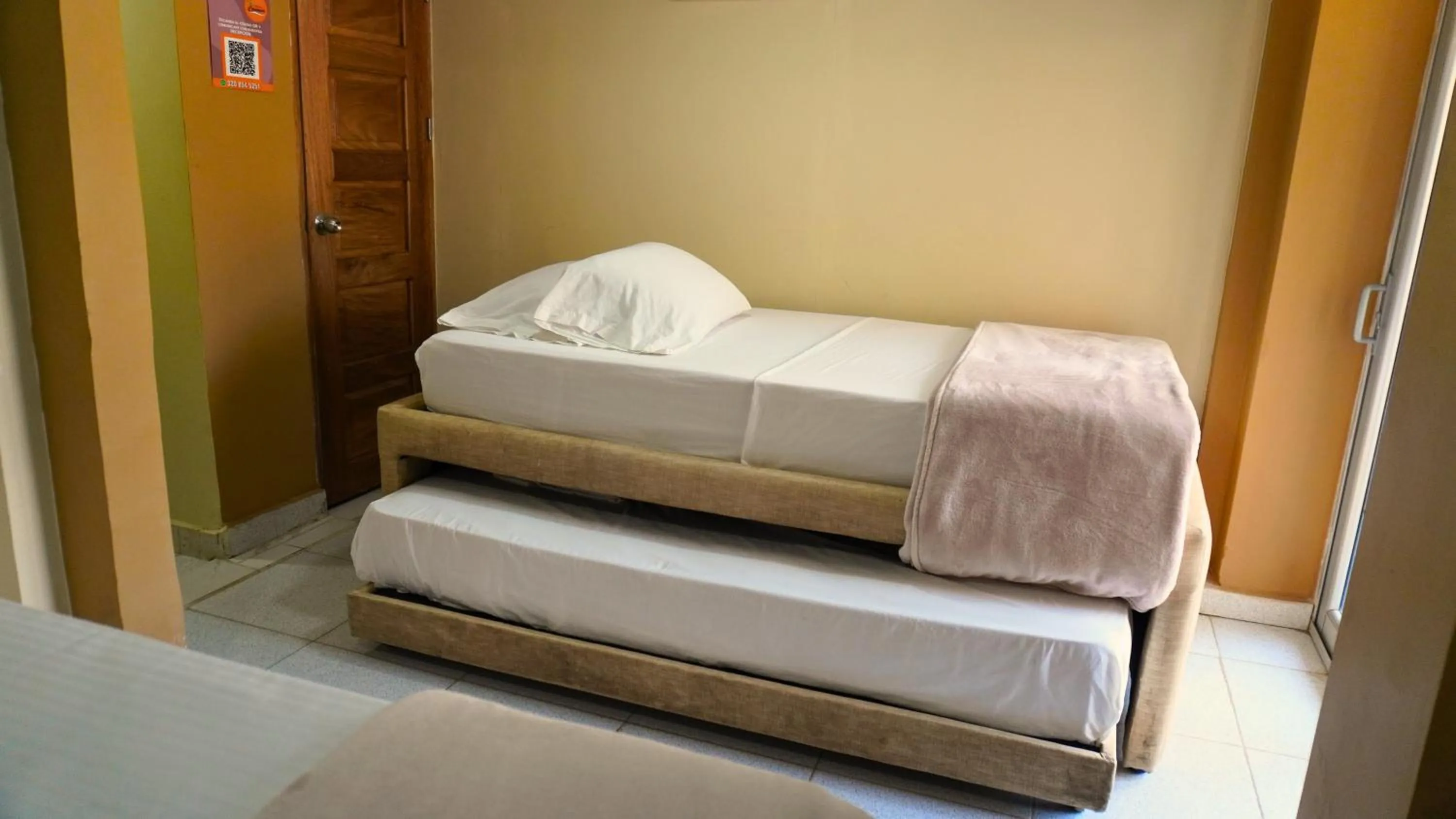 Bed in Hotel y Cabañas Covemar