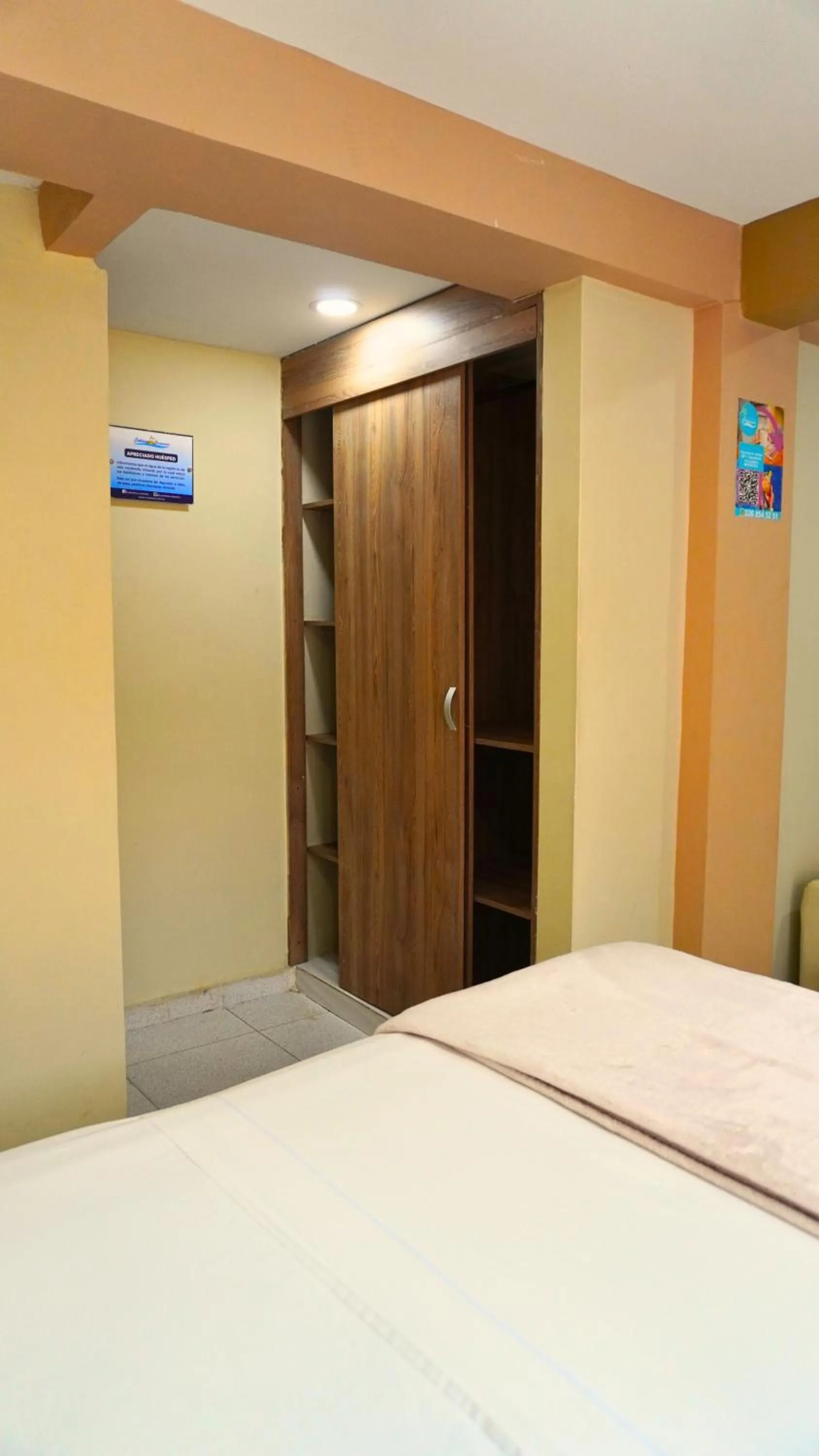 Bedroom in Hotel y Cabañas Covemar