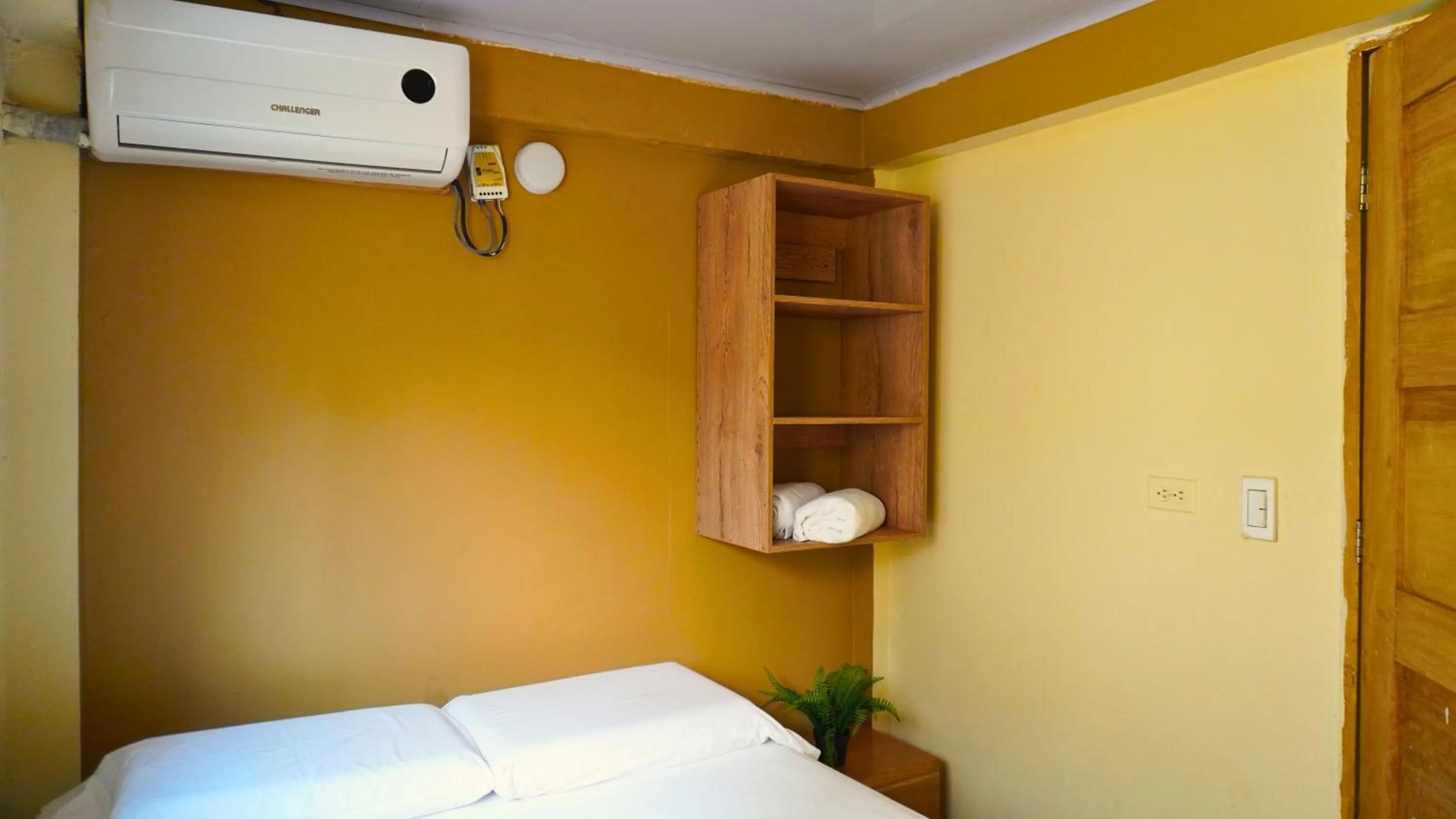 Bed in Hotel y Cabañas Covemar