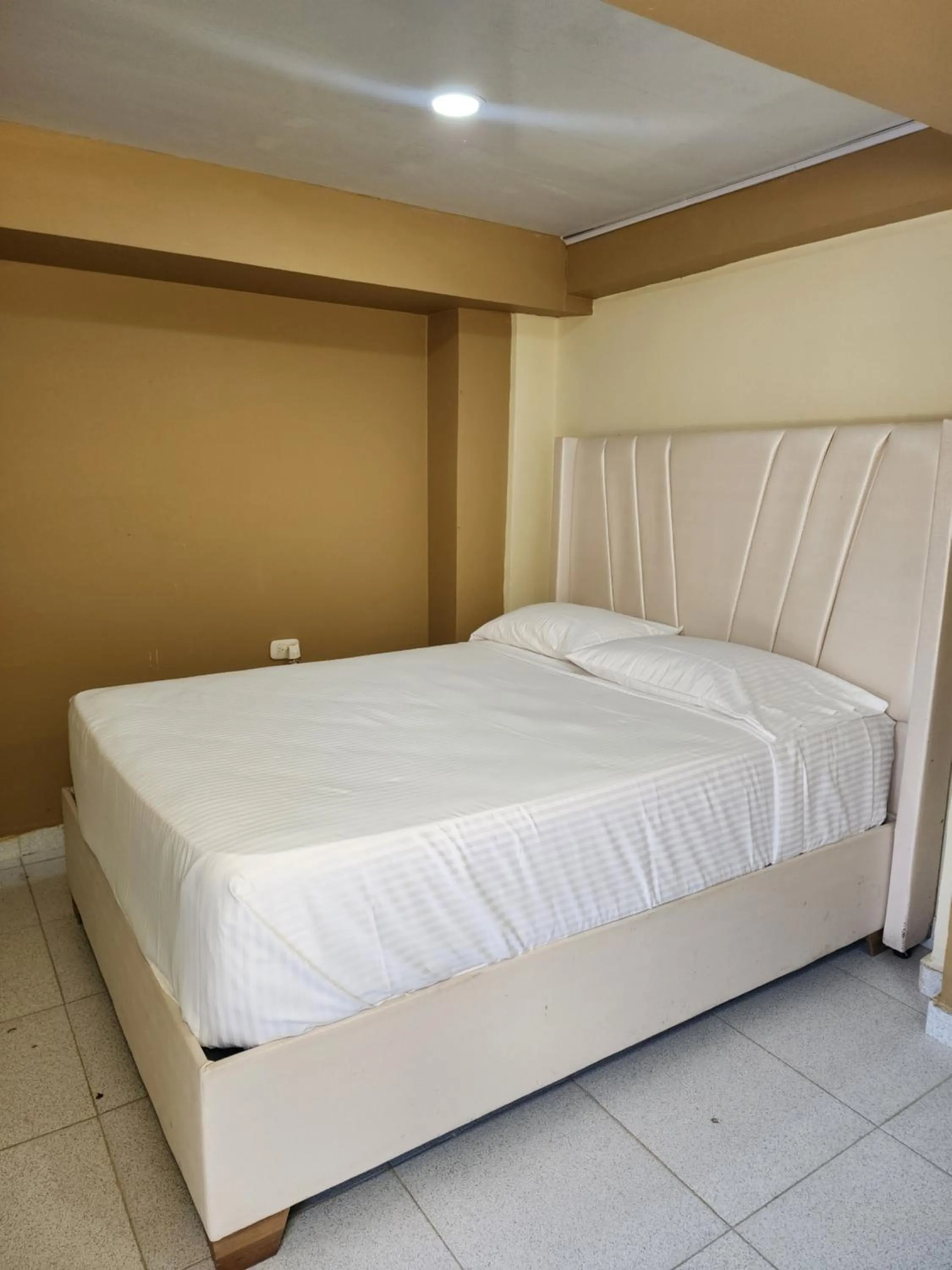 Bed in Hotel y Cabañas Covemar