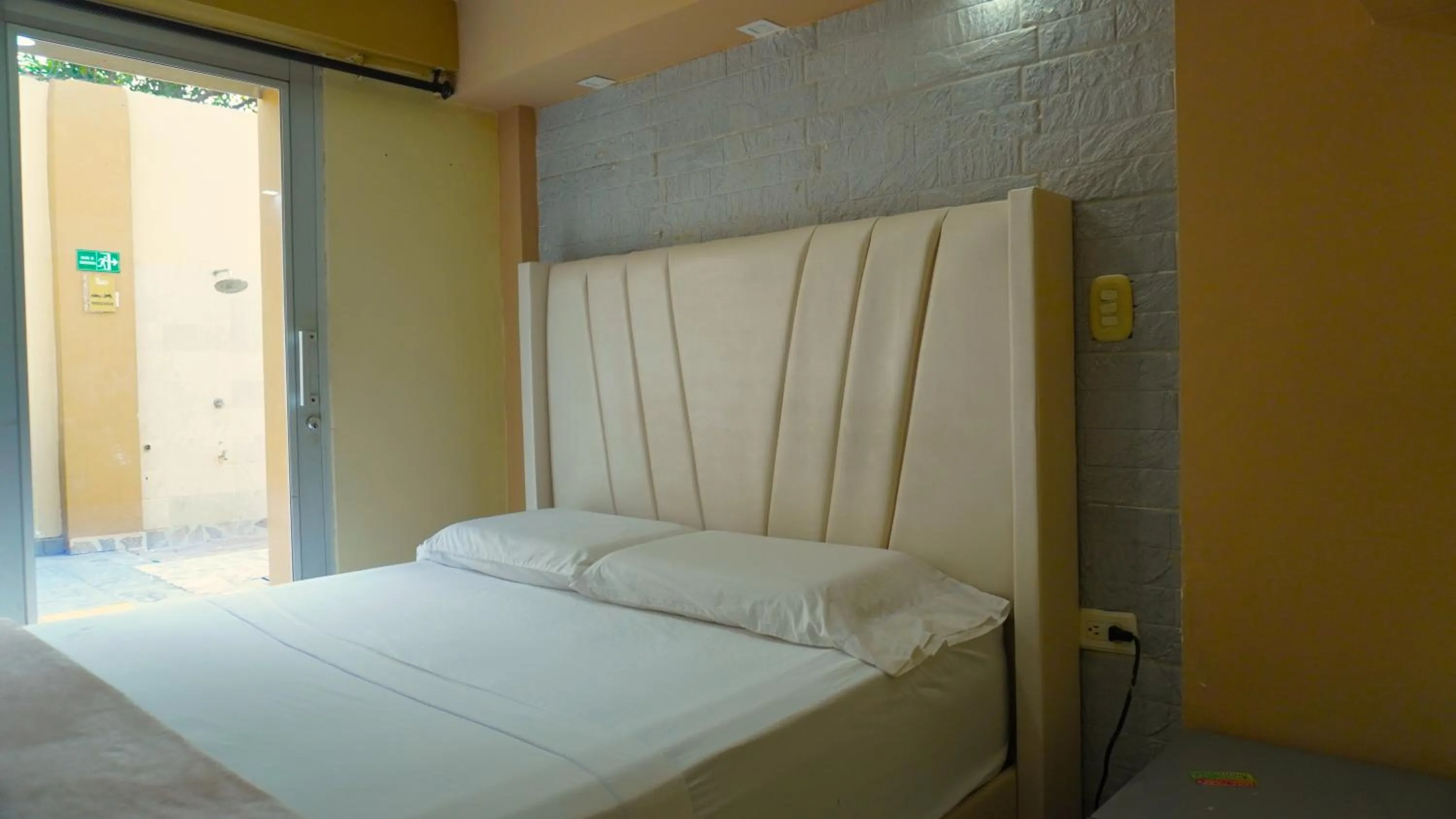 Bed in Hotel y Cabañas Covemar