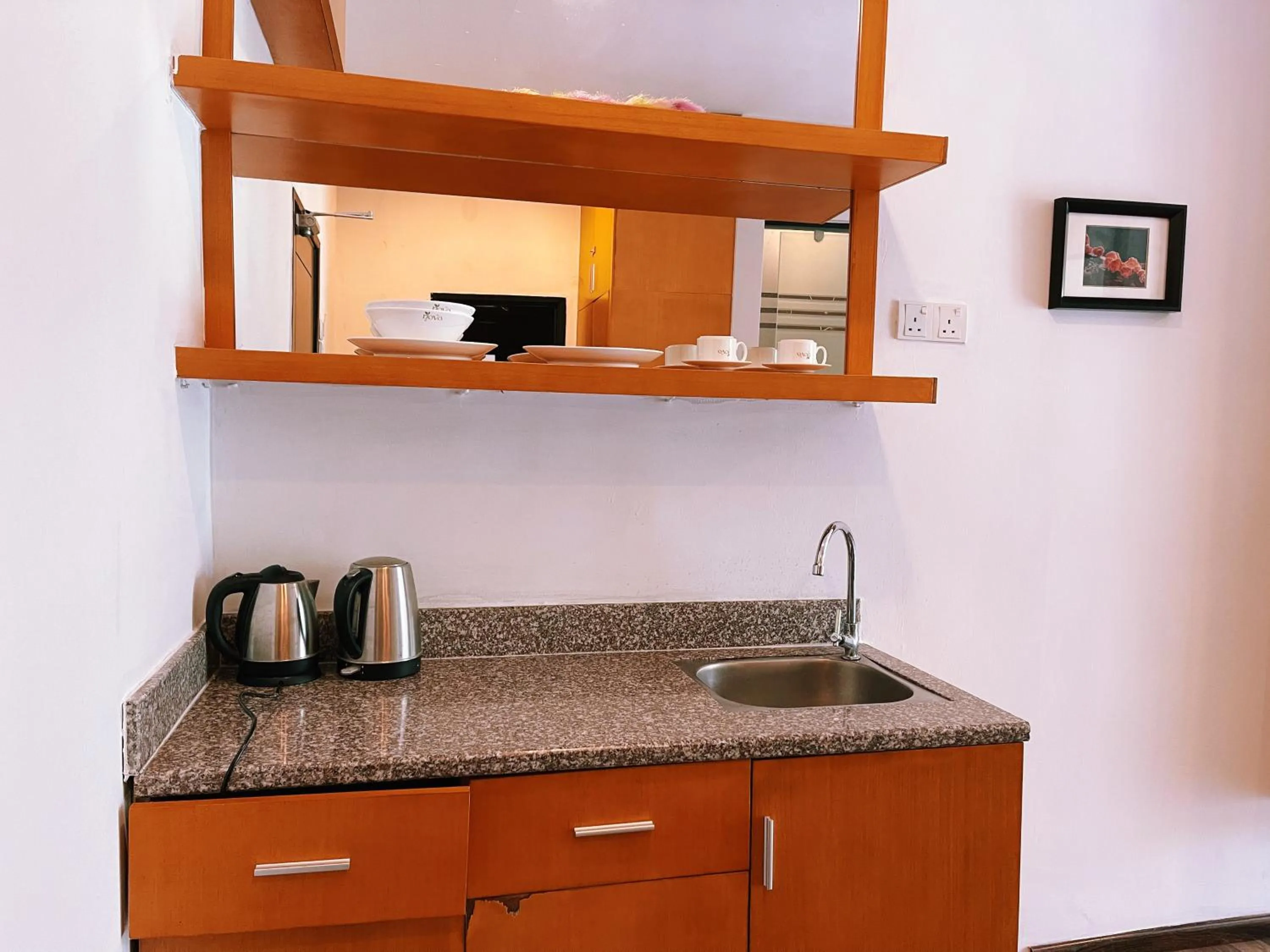 Kitchen or kitchenette in NOVA Apartment at Cameron