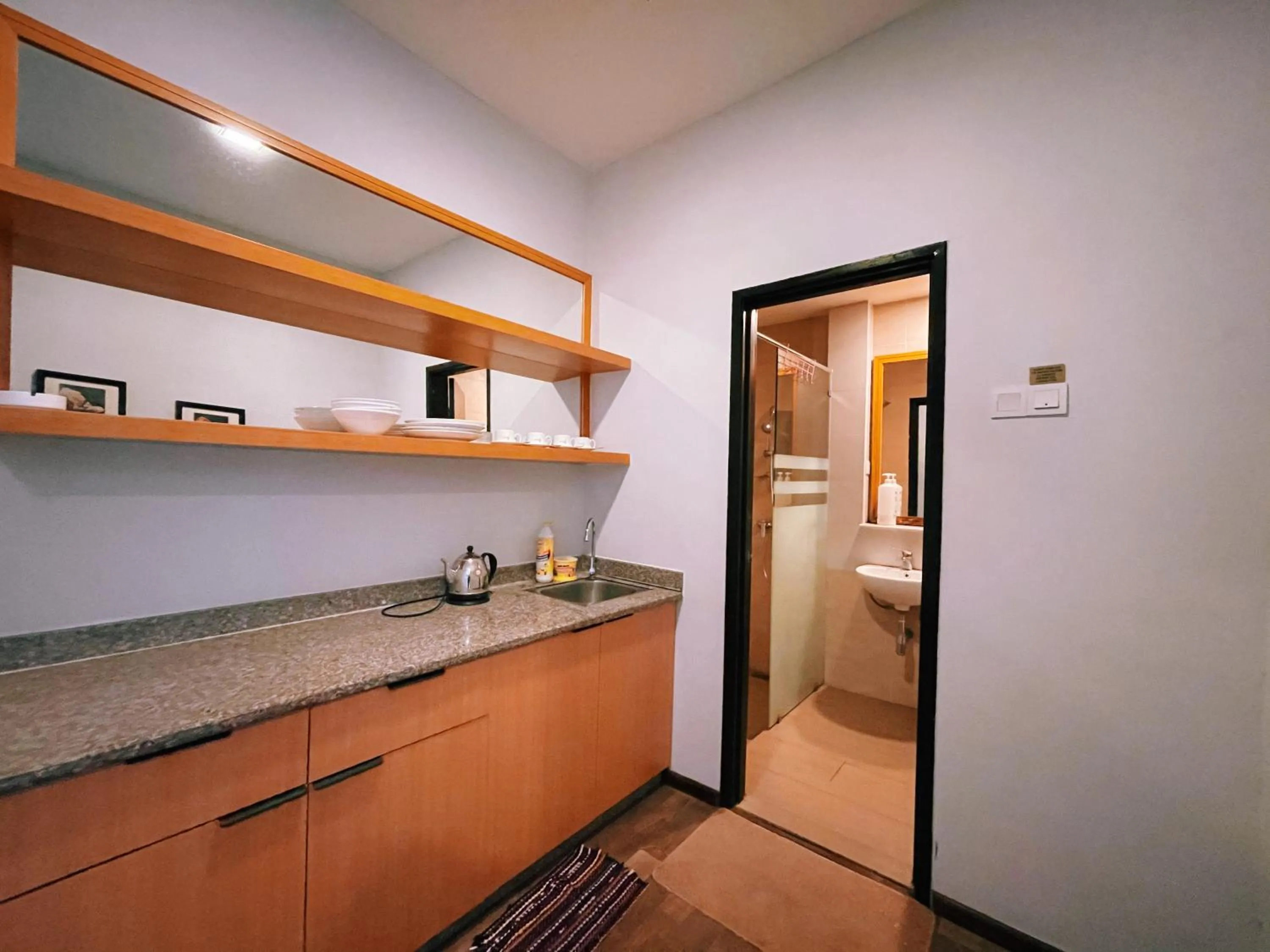 Kitchen or kitchenette in NOVA Apartment at Cameron