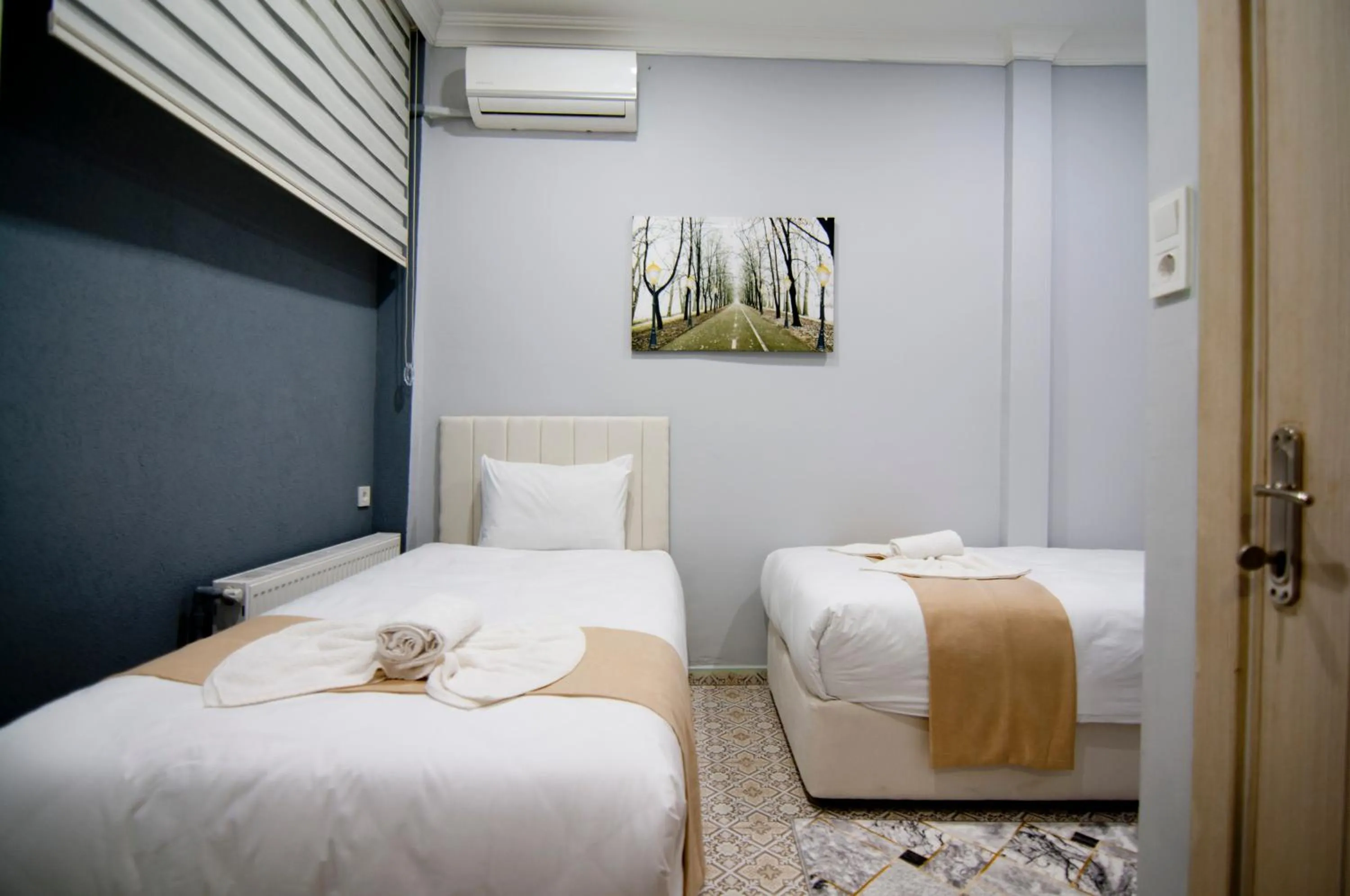 Bed in İstanbul Palace Hotel