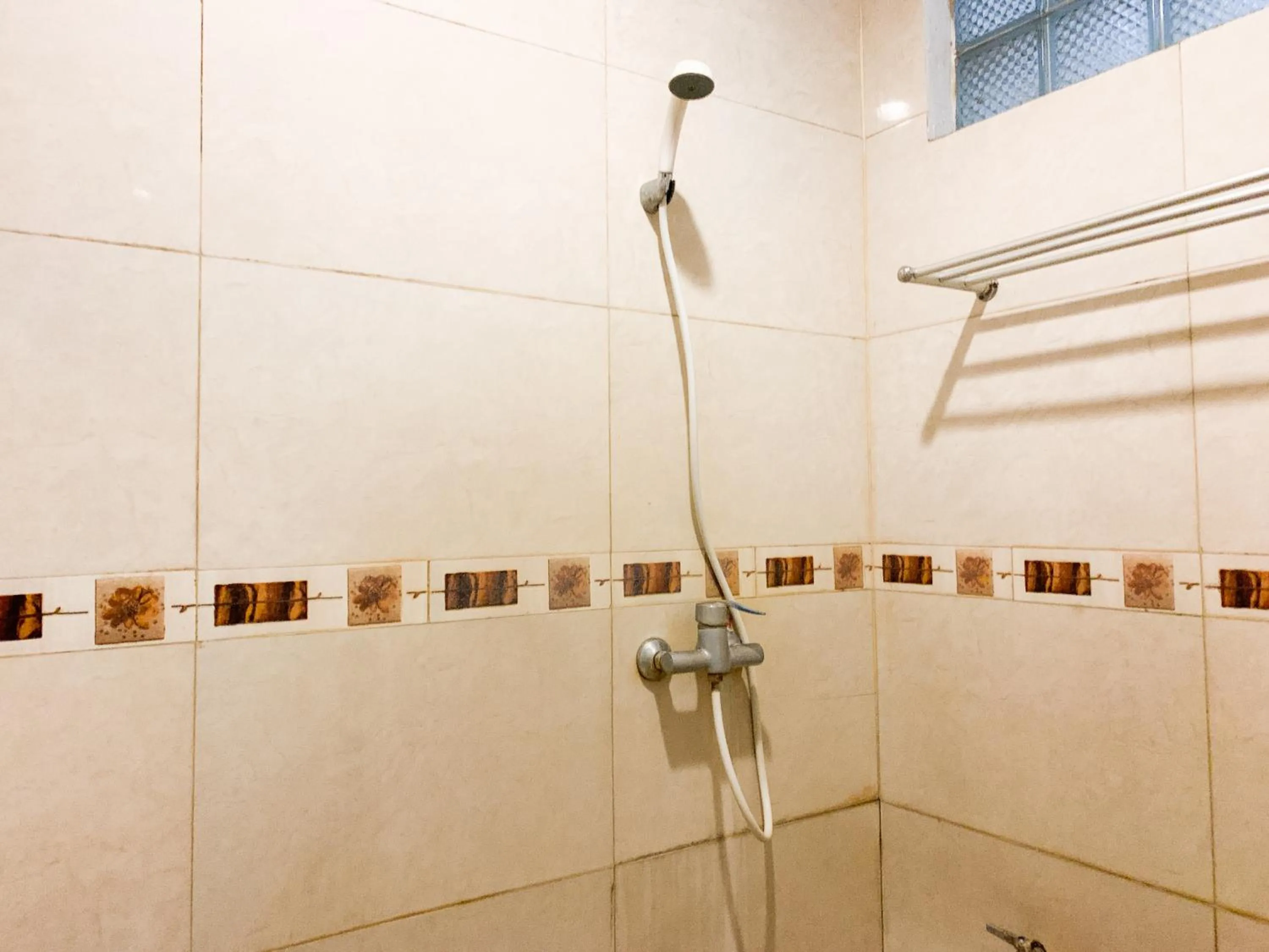 Shower, Bathroom in Musafira Hotel Syariah Malioboro Yogyakarta Mitra RedDoorz
