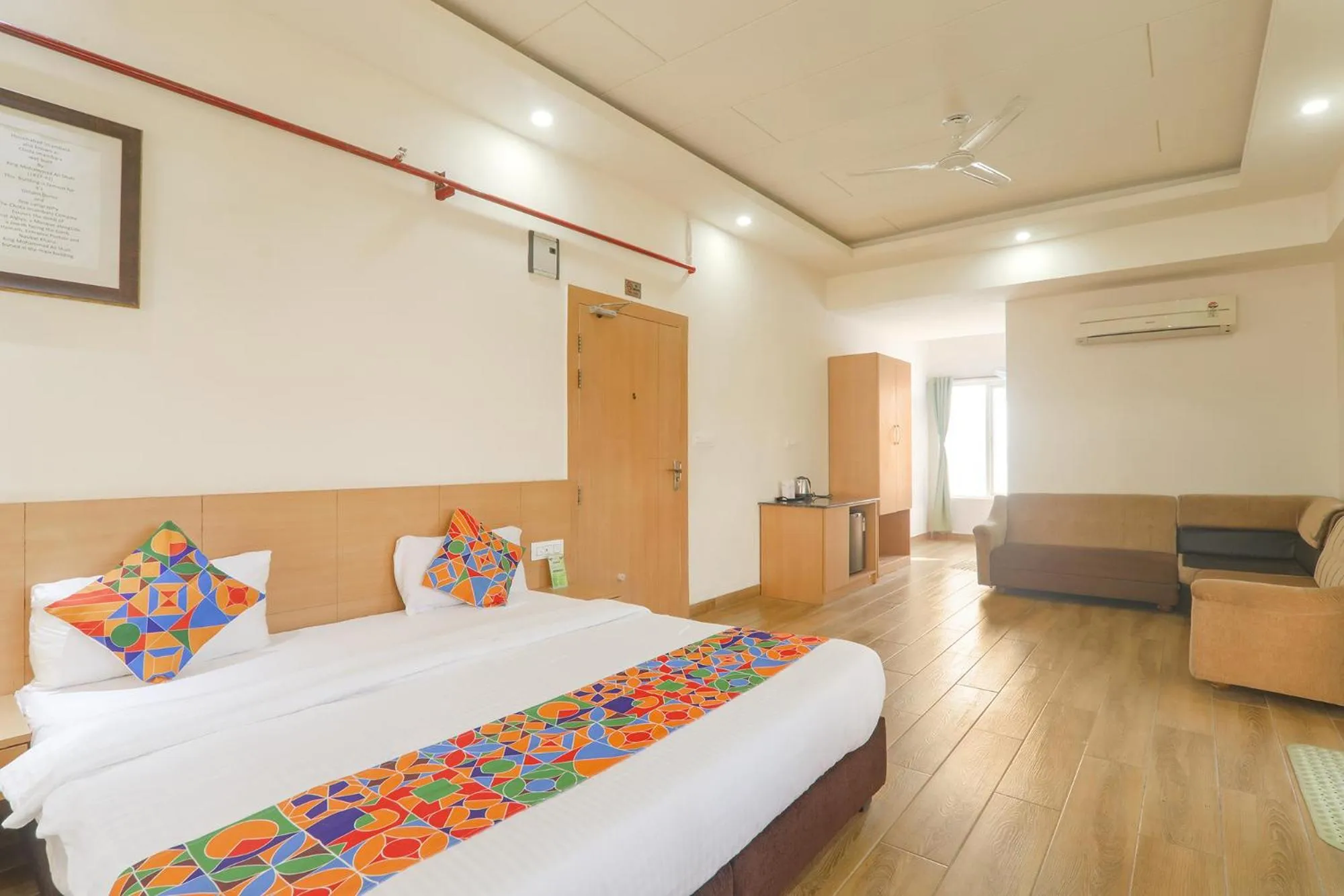 Bed in FabHotel Raghubar Kripa