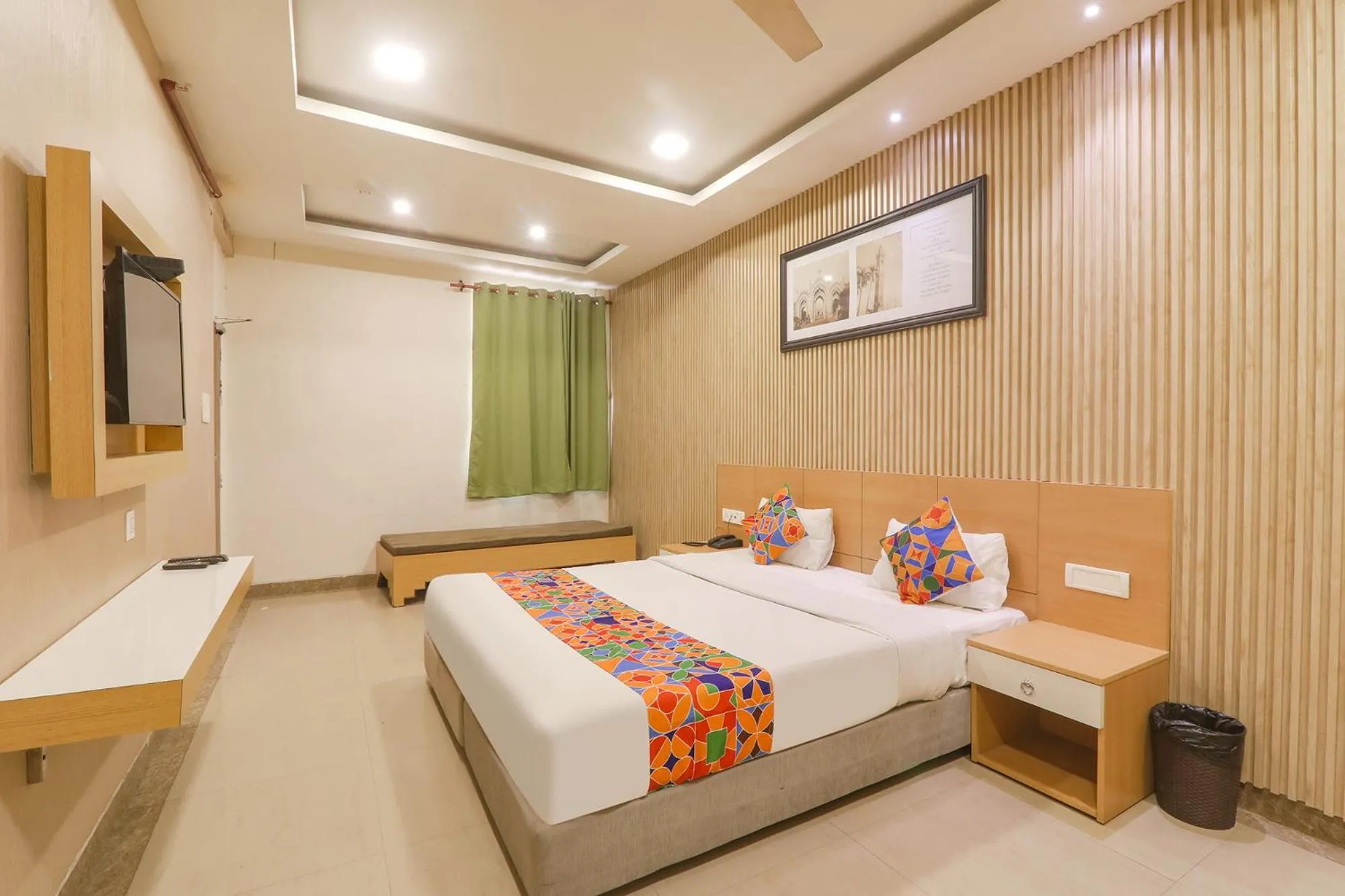 Bed in FabHotel Raghubar Kripa