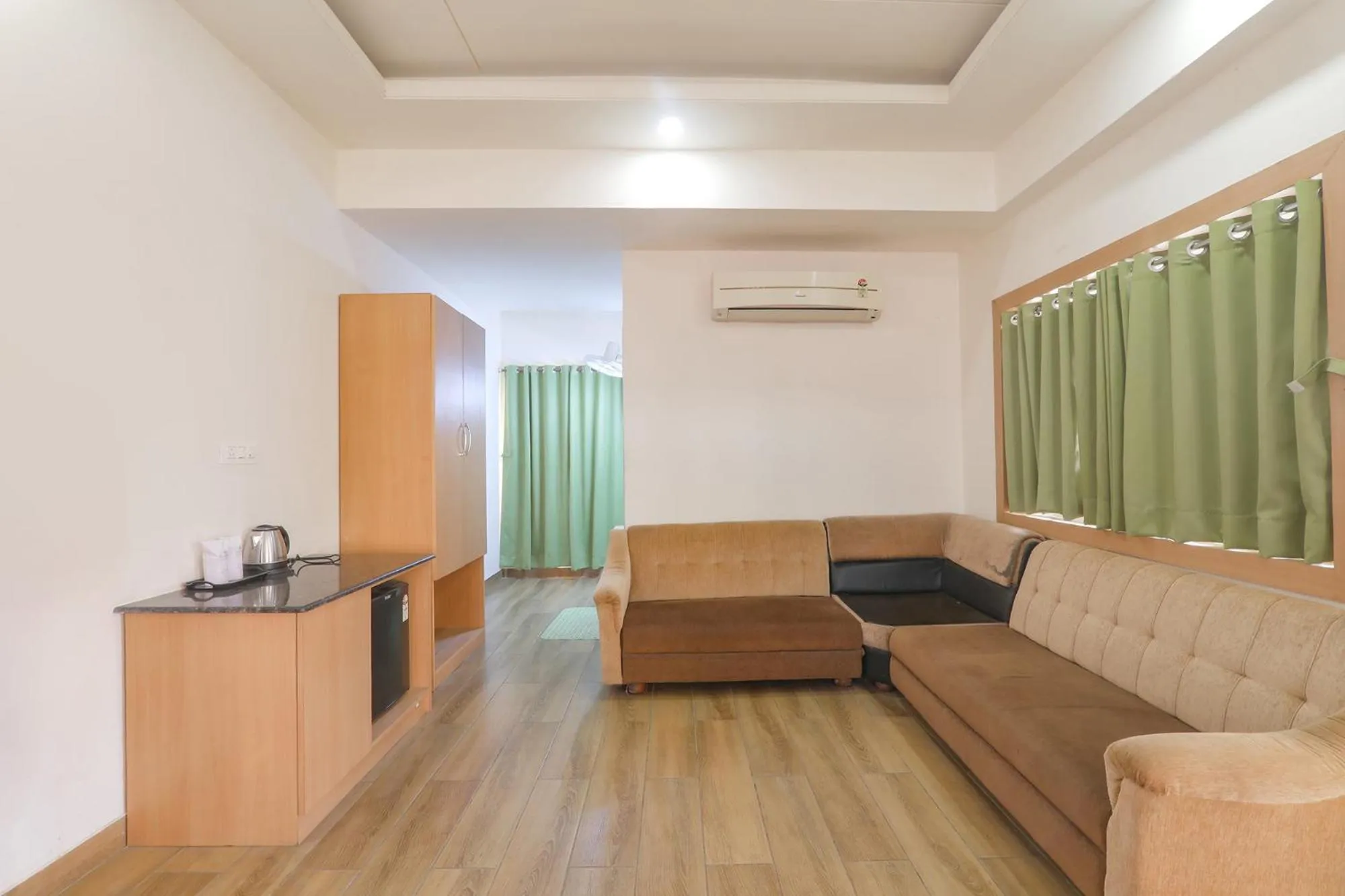 Bed in FabHotel Raghubar Kripa