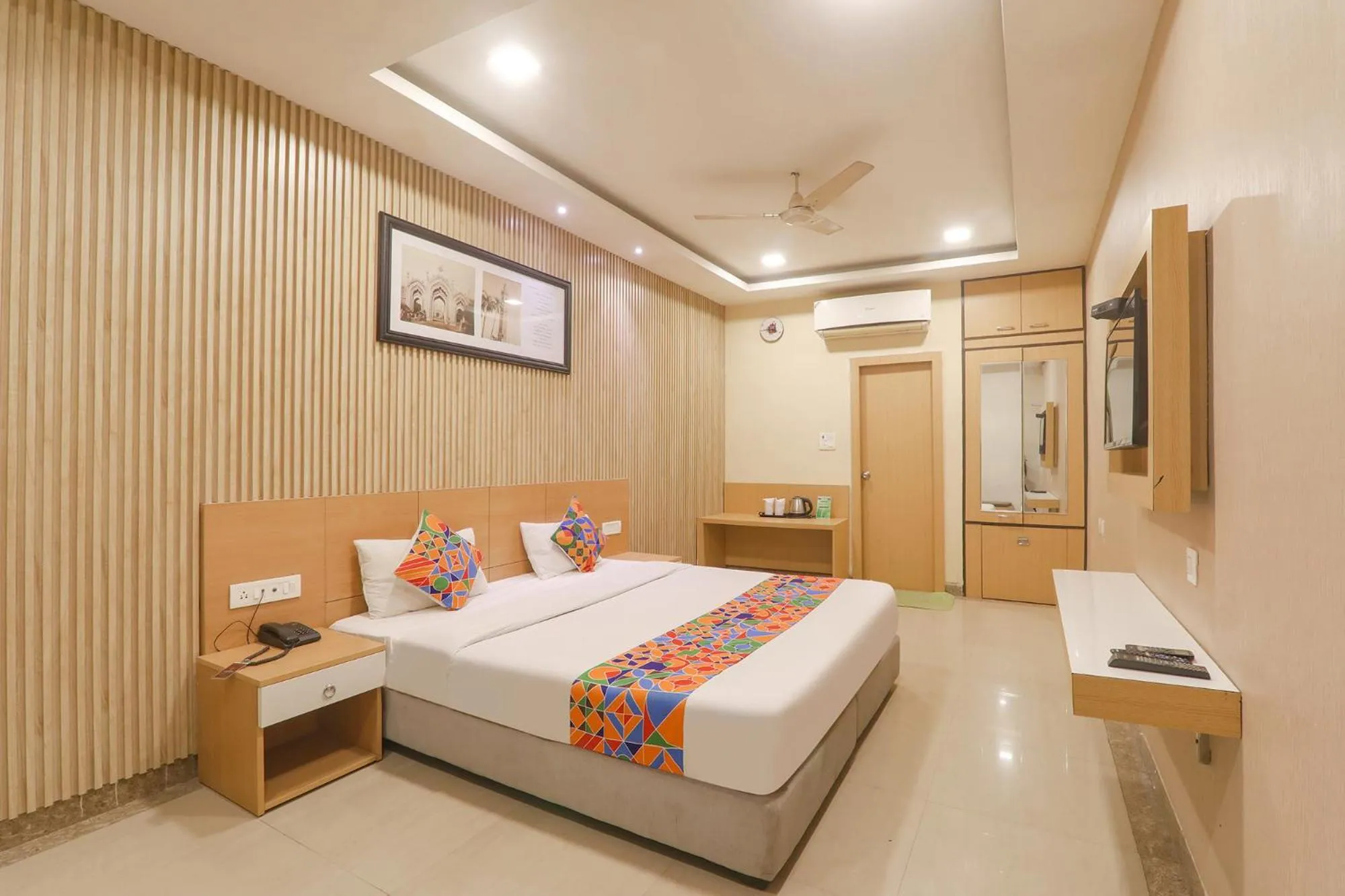 Bed in FabHotel Raghubar Kripa