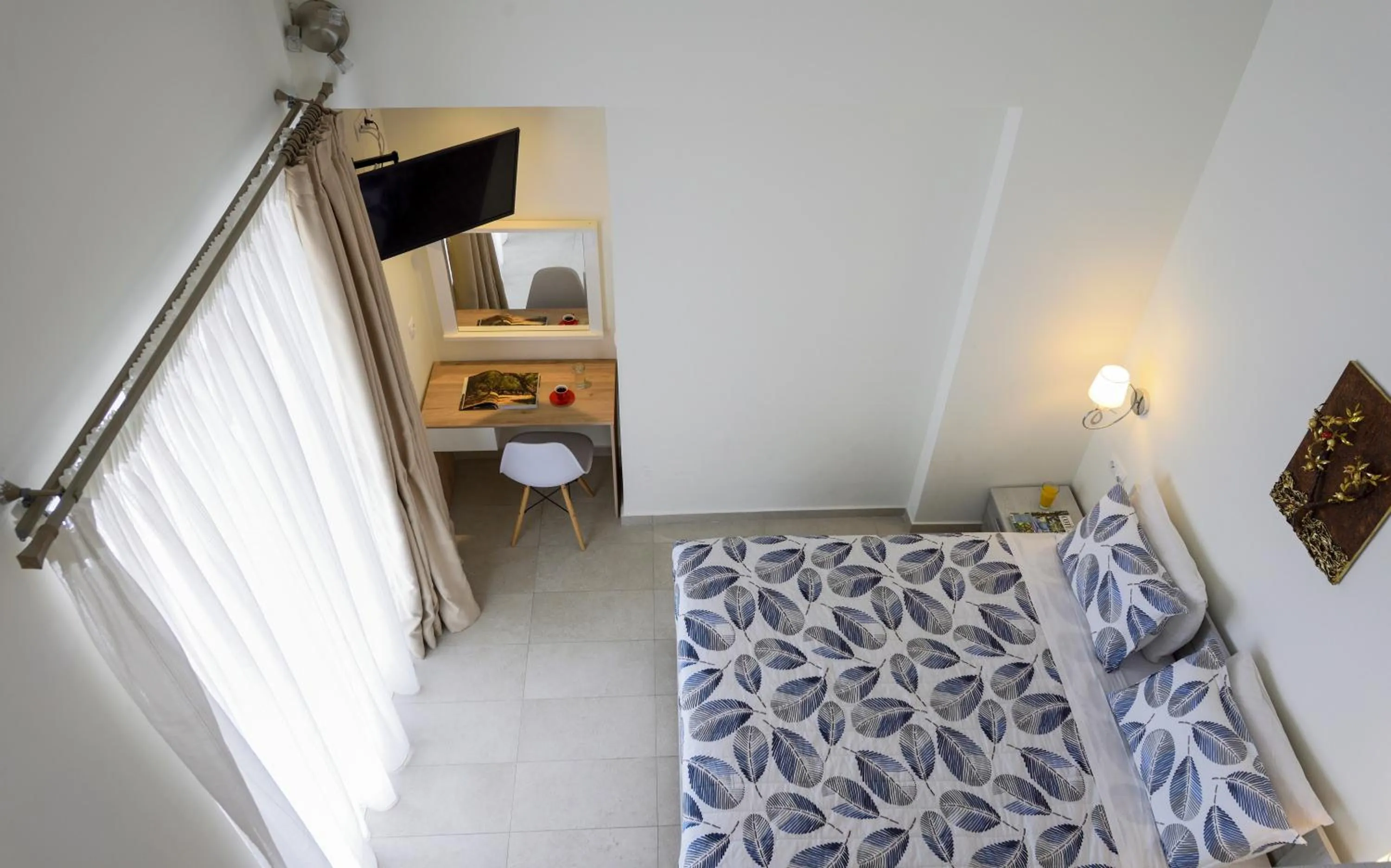 Bed in Elpiniki Luxury Rooms