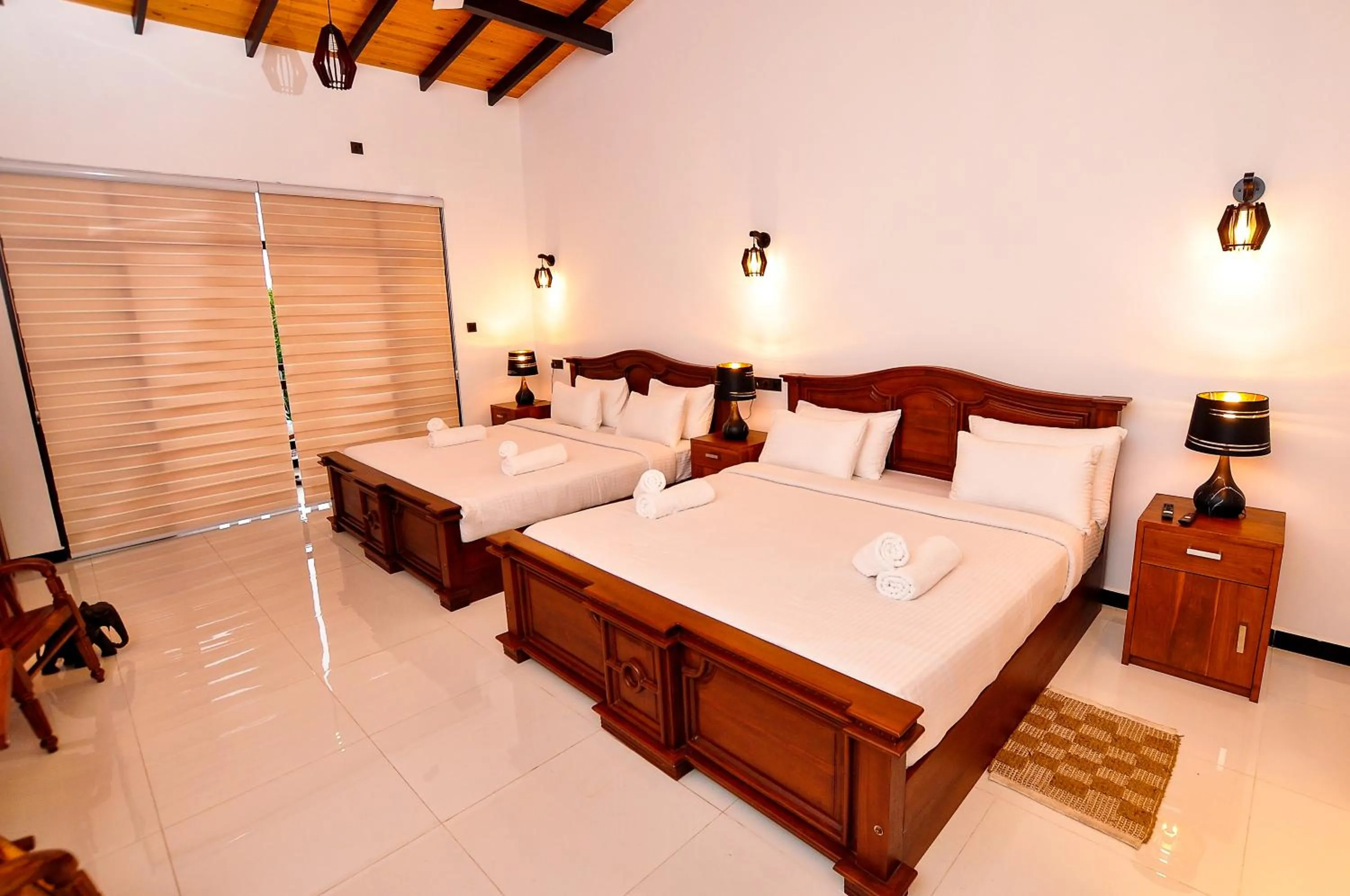 Bed in Sachinro Hotel Mirissa