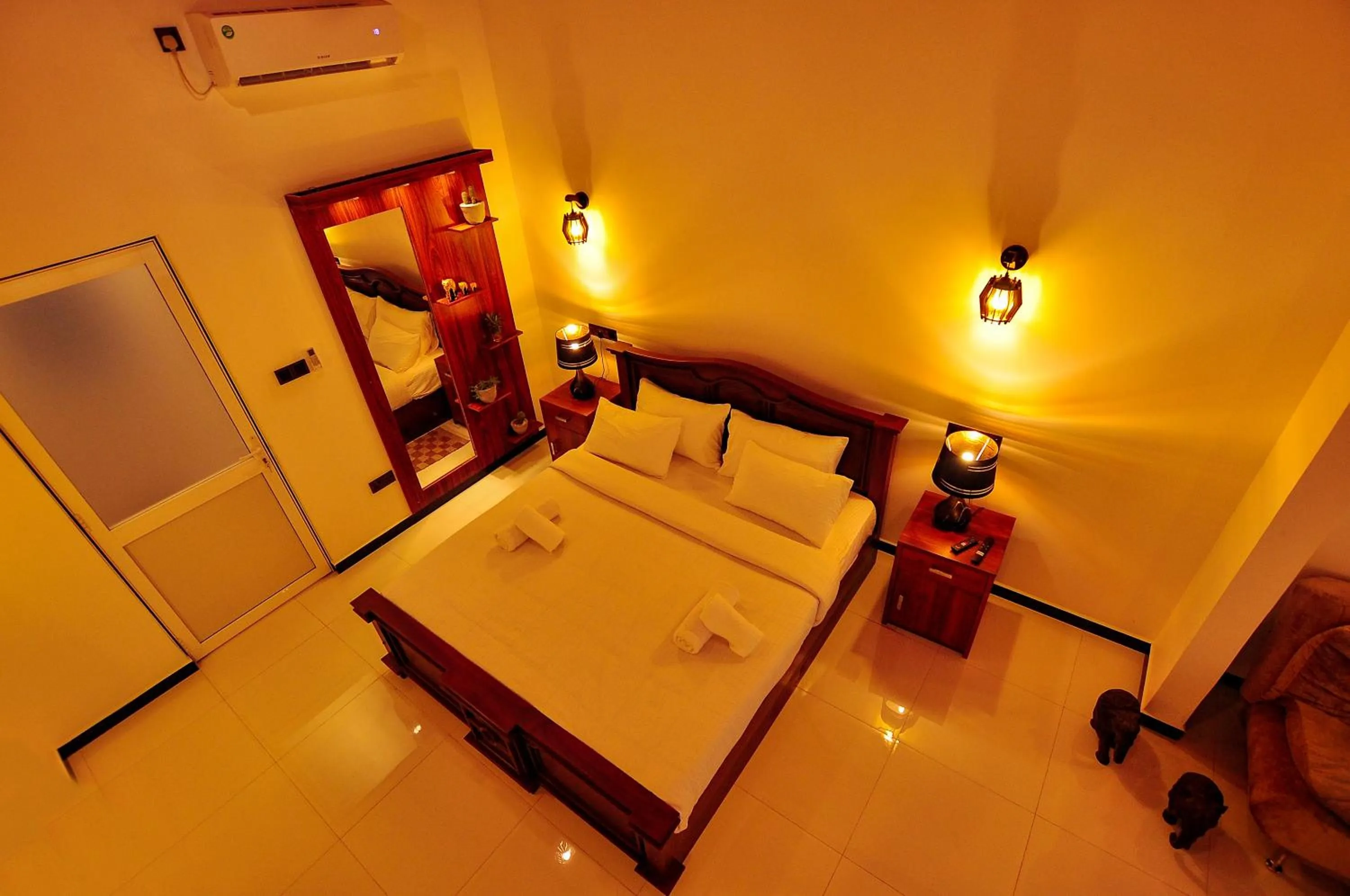 Bed in Sachinro Hotel Mirissa