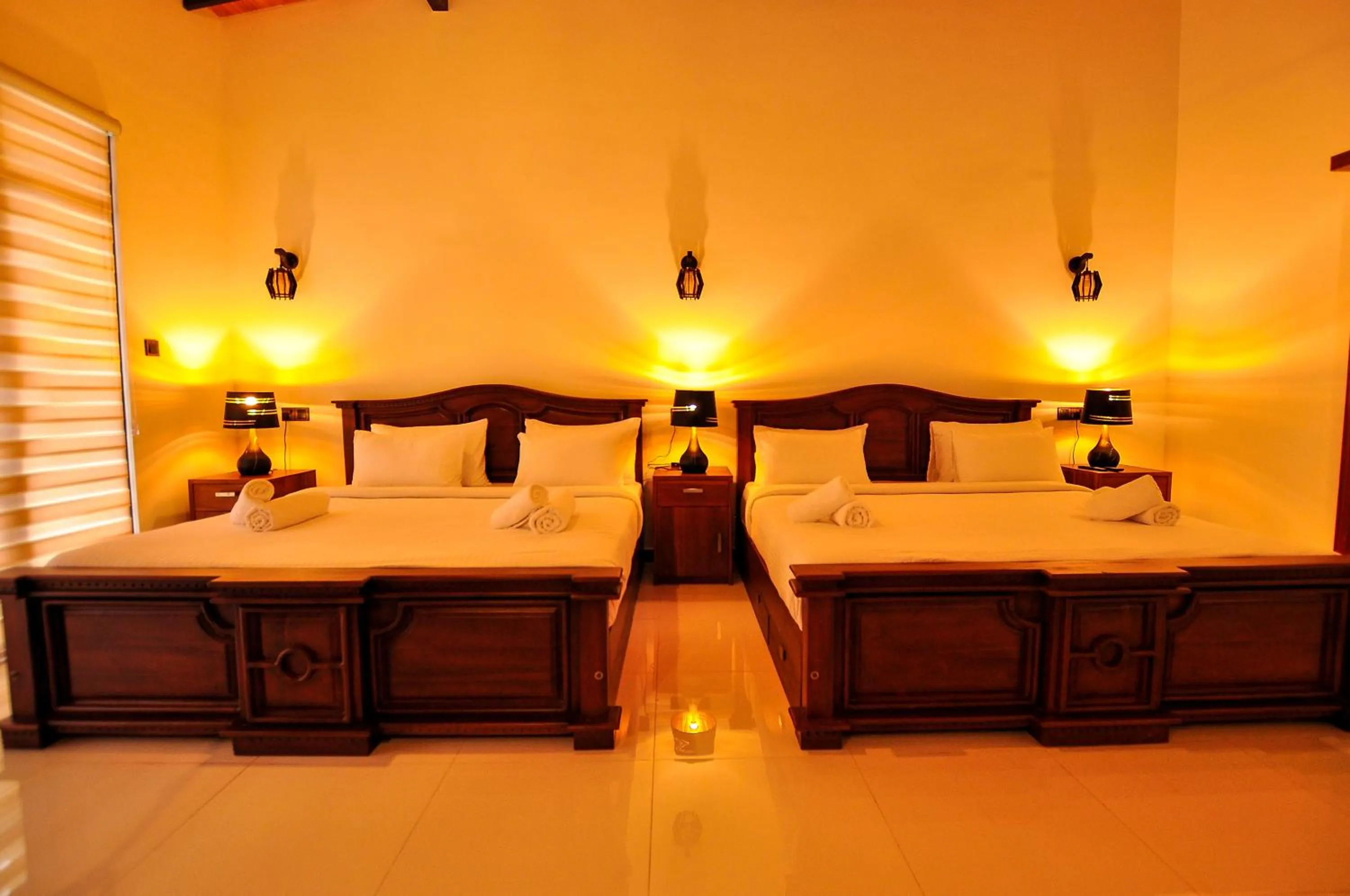 Bed in Sachinro Hotel Mirissa