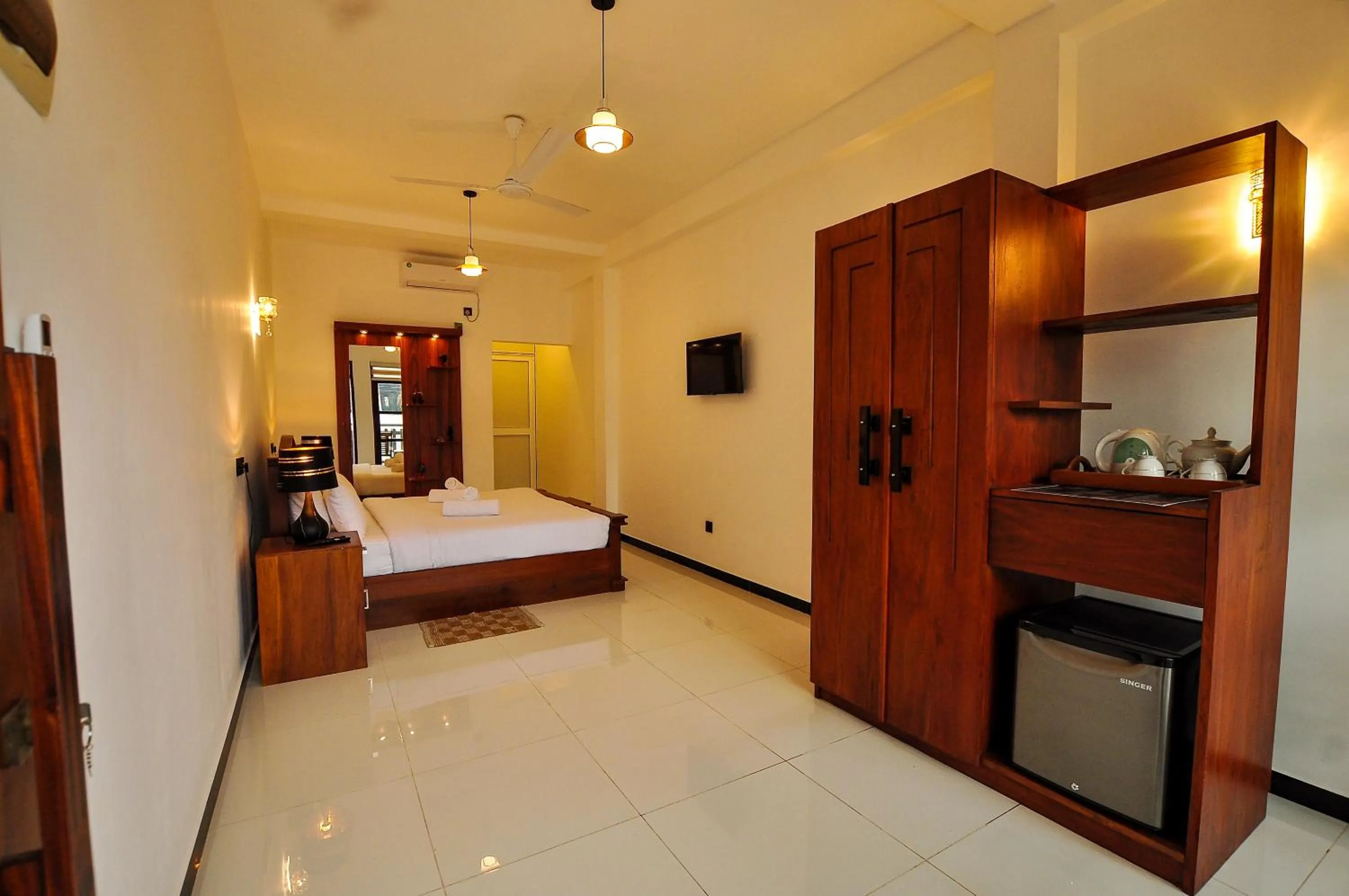 Bed in Sachinro Hotel Mirissa